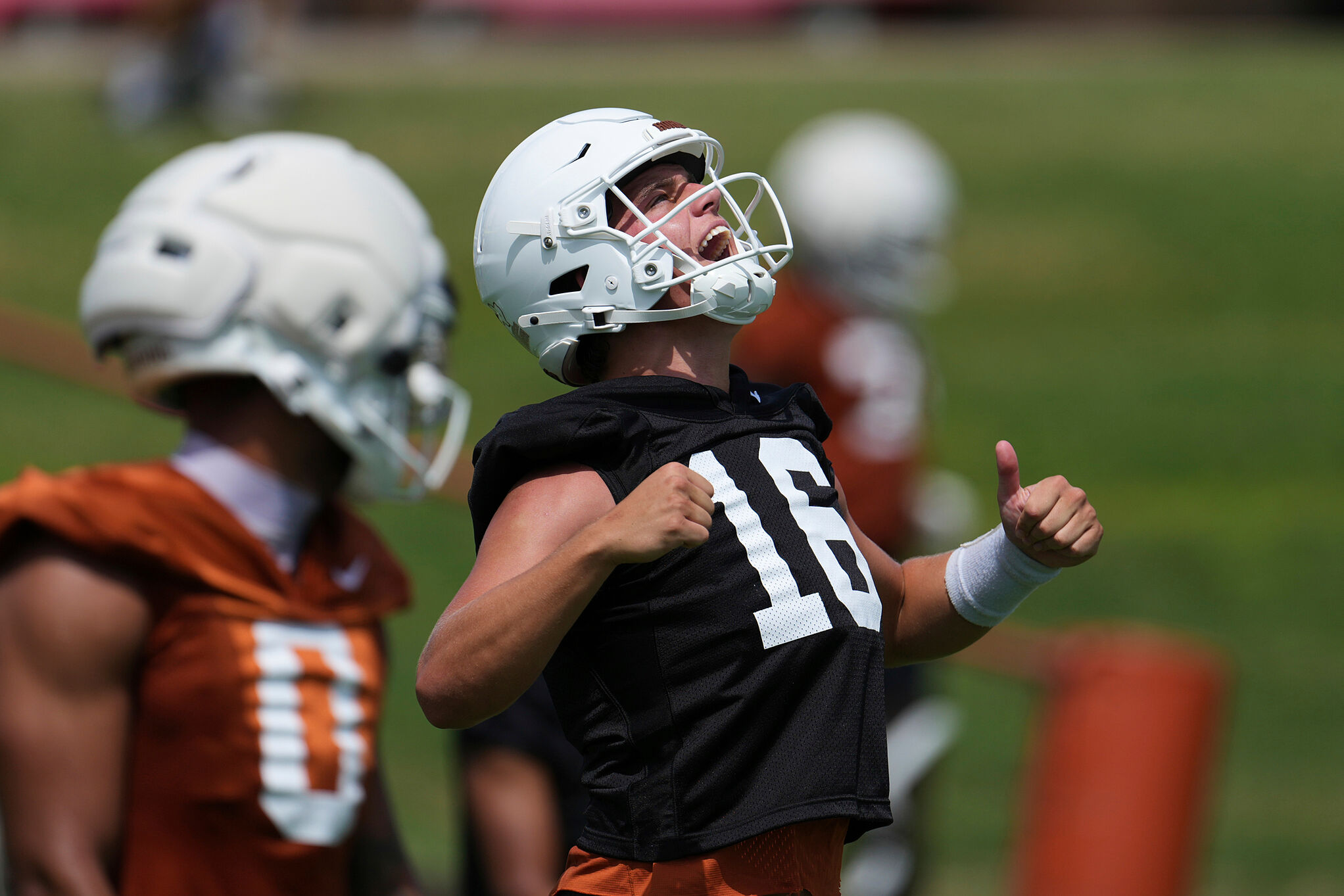 Texas quarterback Arch Manning (16) reacts during an NCAA college football practice in Austin, Texas
