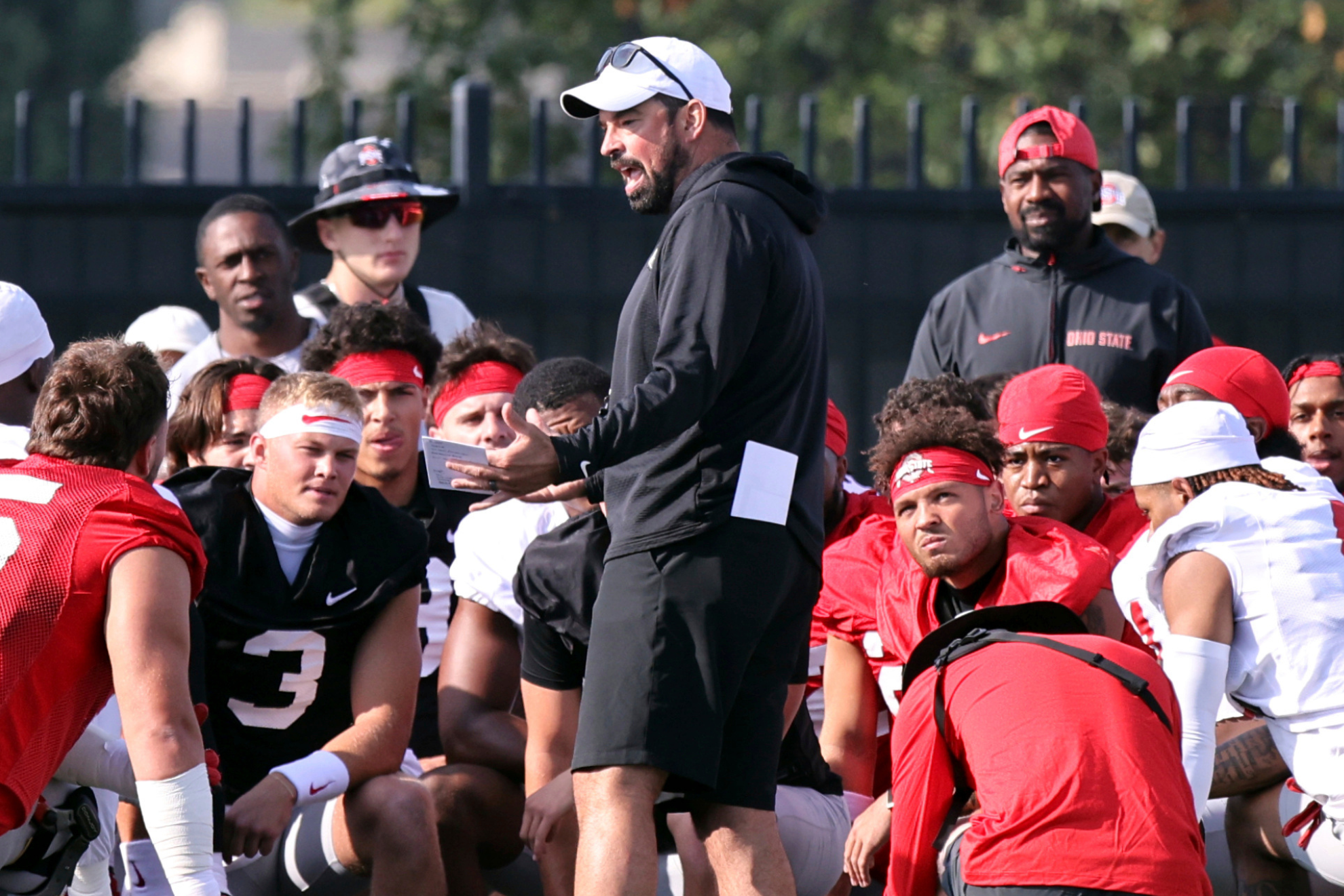 Ryan Day talks to his Ohio State Buckeyes team during a preseason practice.