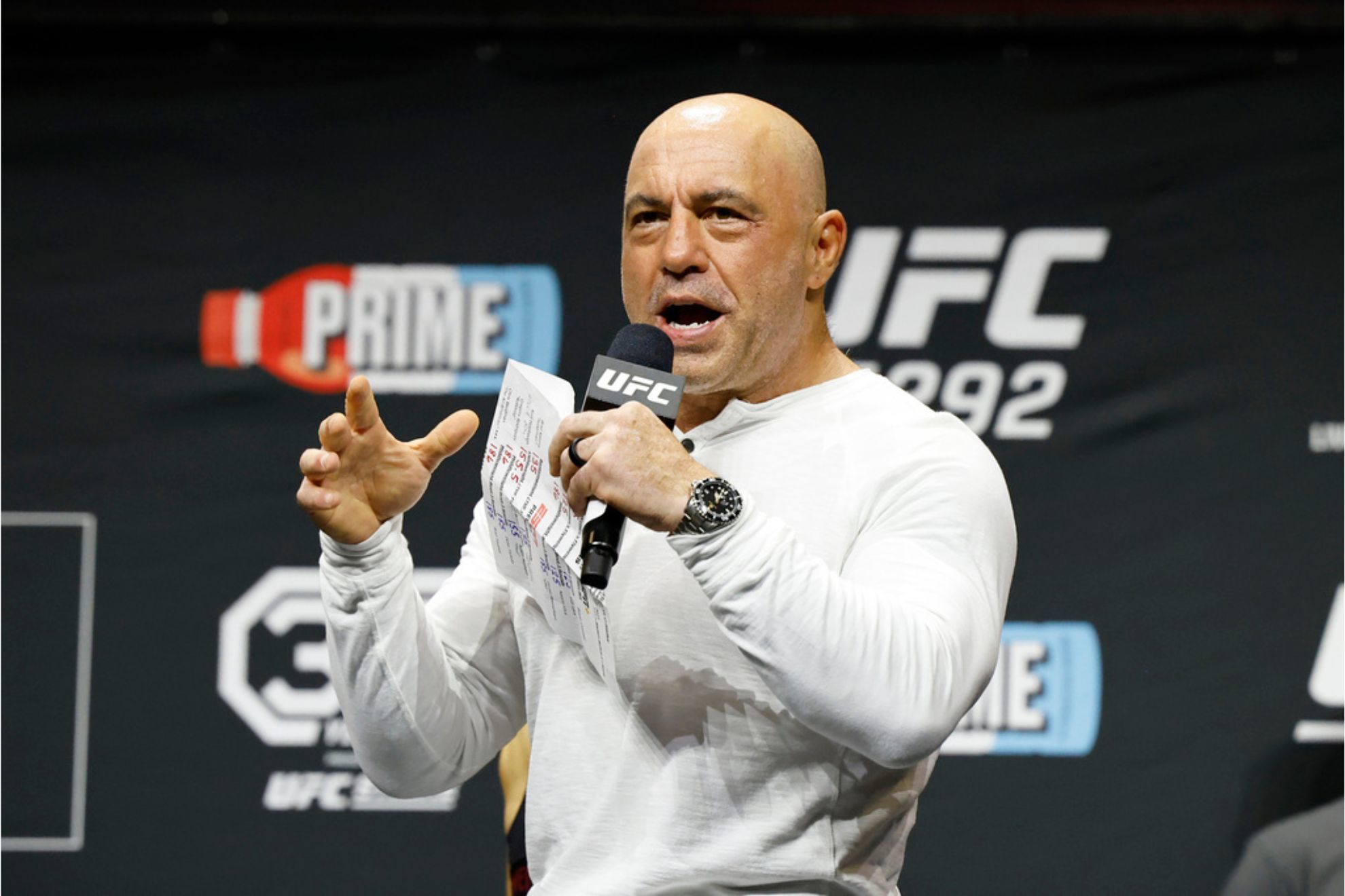 Joe Rogan is seen at the ceremonial weigh-in for the UFC 292 mixed martial arts event