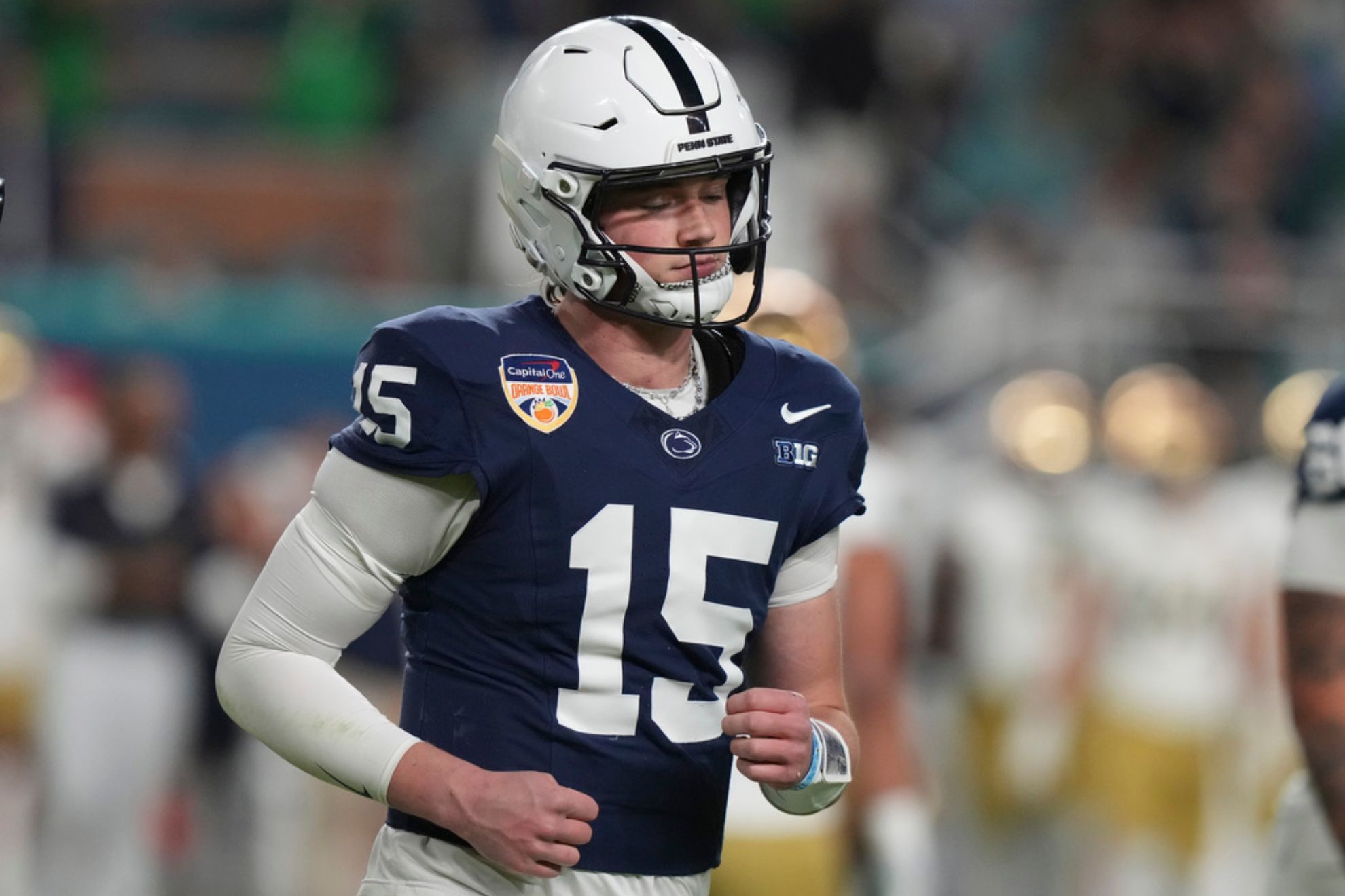 Penn State quarterback Drew Allar walks off the field during first half of the Orange Bowl College Football Playoff semifinal game against Notre Dame