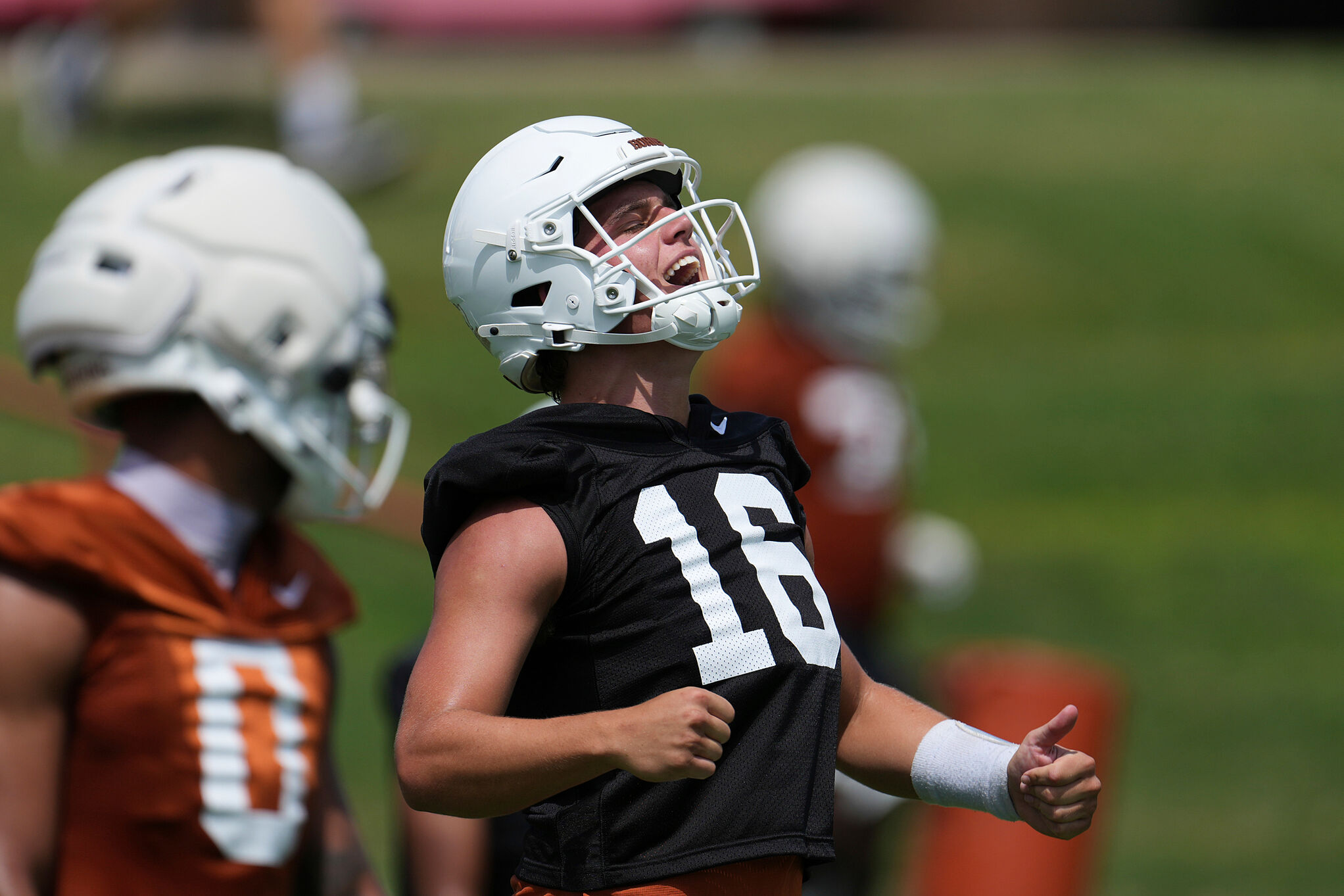 Texas quarterback Arch Manning (16) reacts during an NCAA college football practice in Austin, Texas