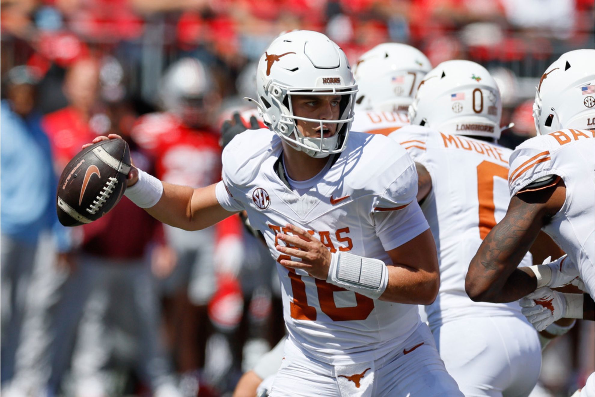 Texas quarterback Arch Manning drops back to pass against Ohio State during the first half of an NCAA college football game