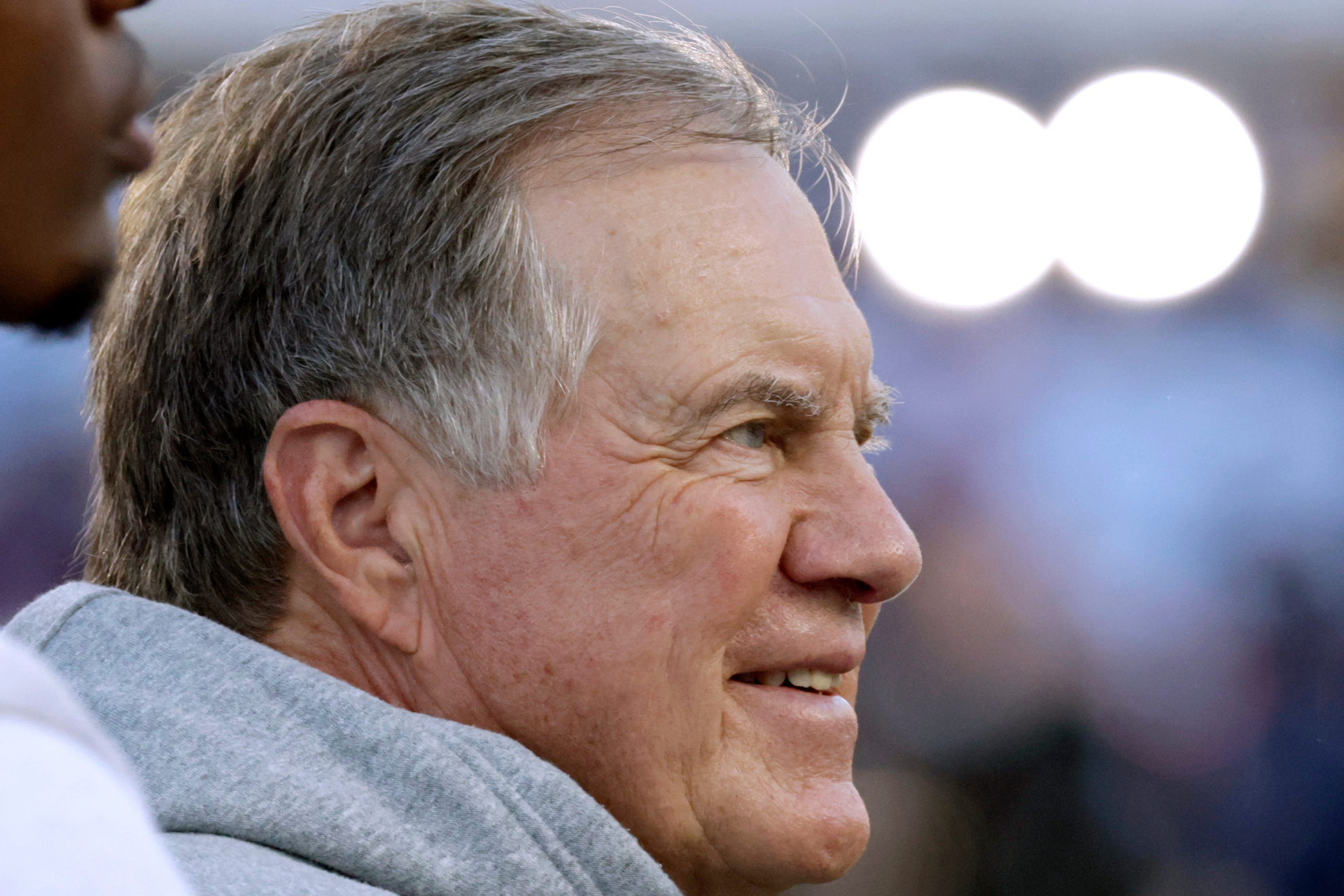 Bill Belichick smiles during his college football head coaching debut with the North Carolina Tar Heels.