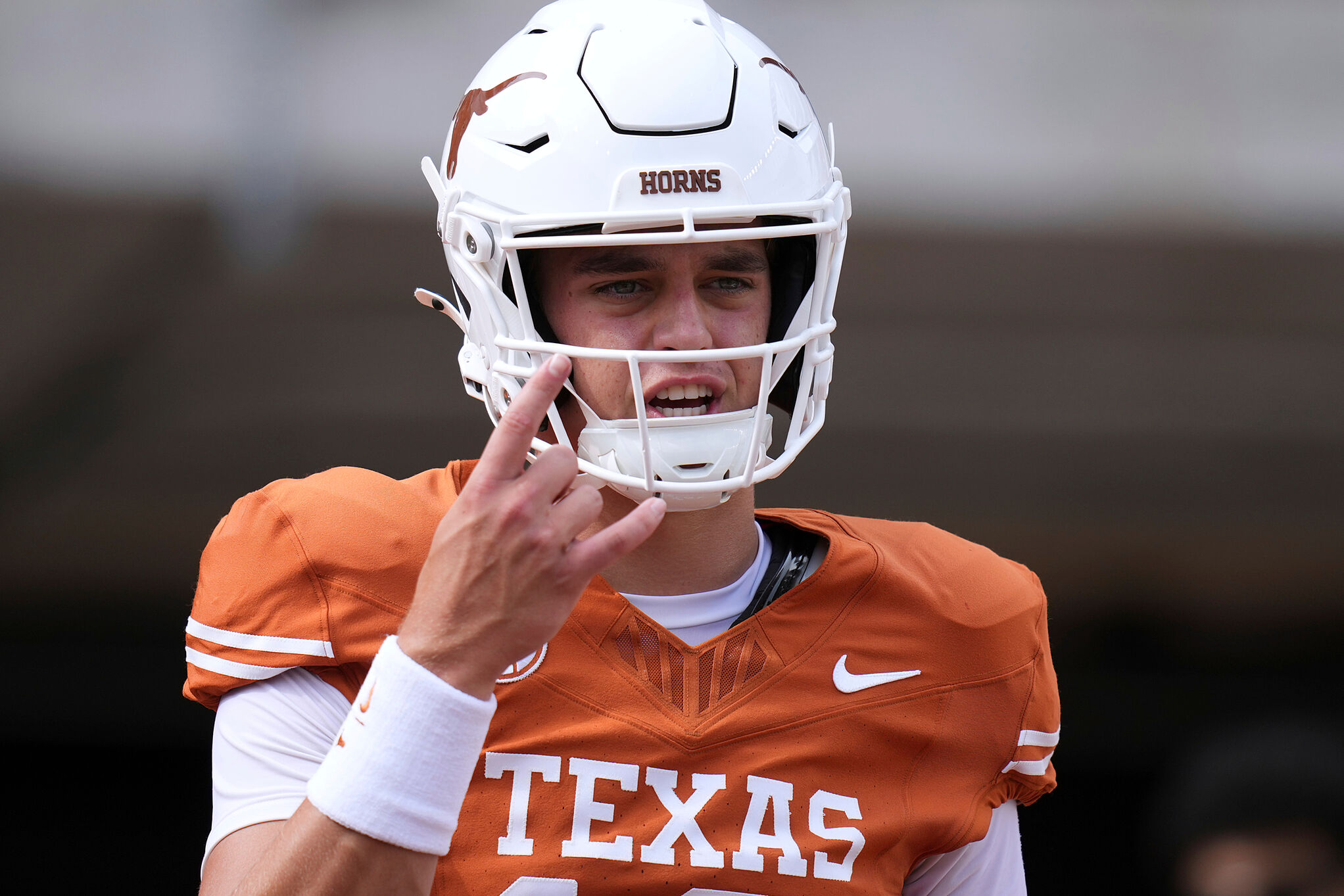 Texas quarterback Arch Manning warms up before an NCAA college football game against San Jose State in Austin, Texas