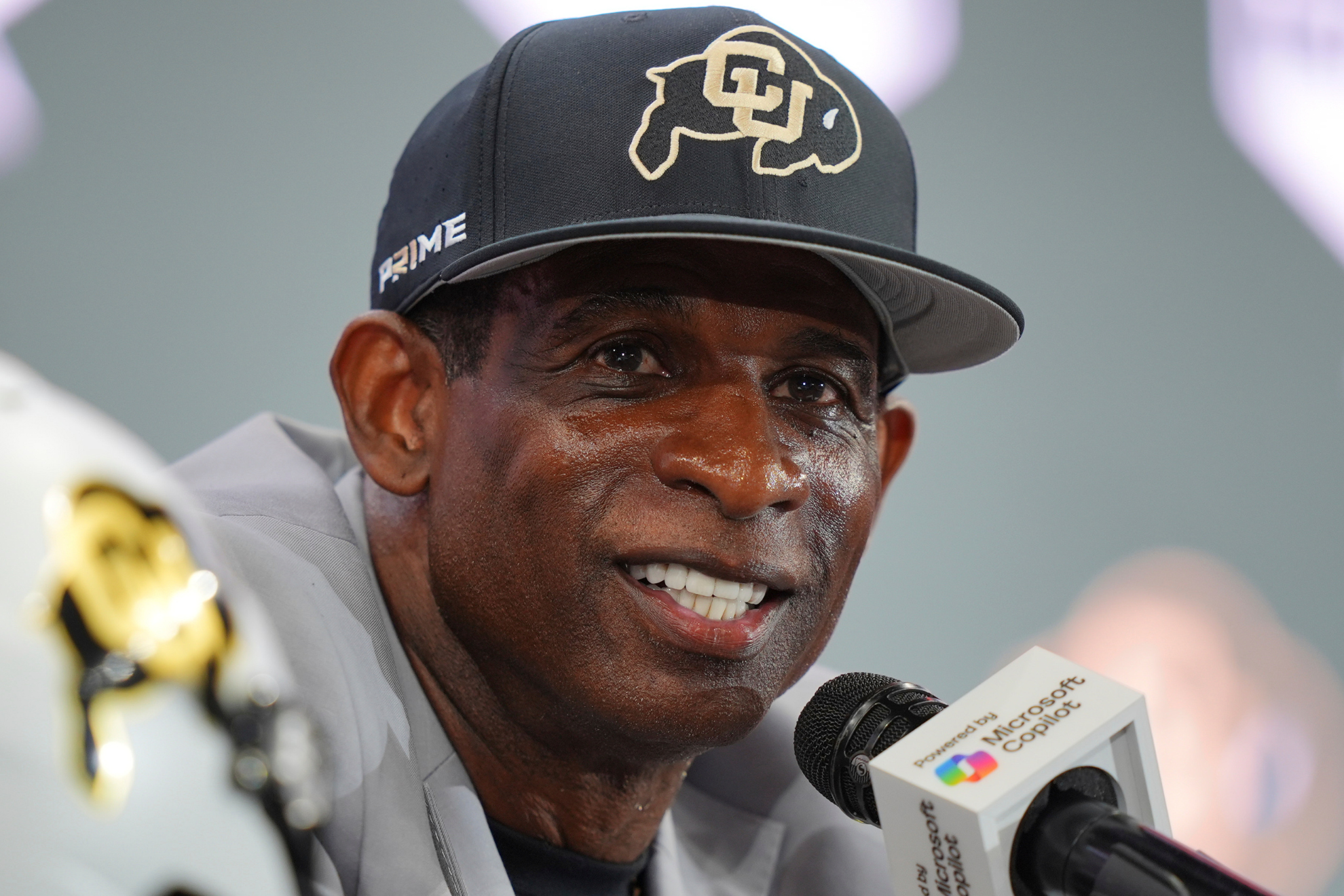 Deion Sanders speaks to the media during a press conference as the head coach of the Colorado Buffaloes.