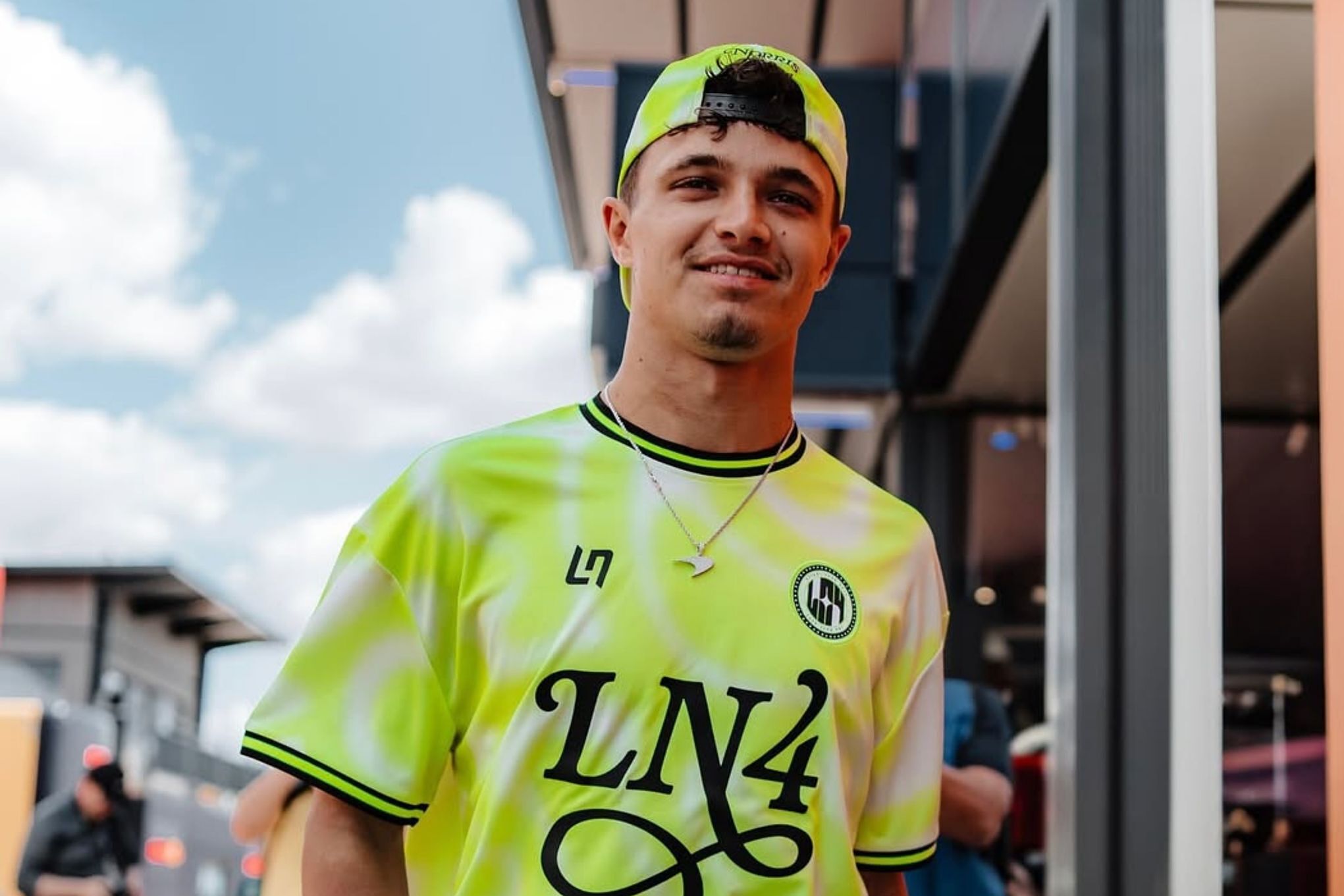 Lando Norris brings his McLaren racing style to the football field in Austin, Texas.