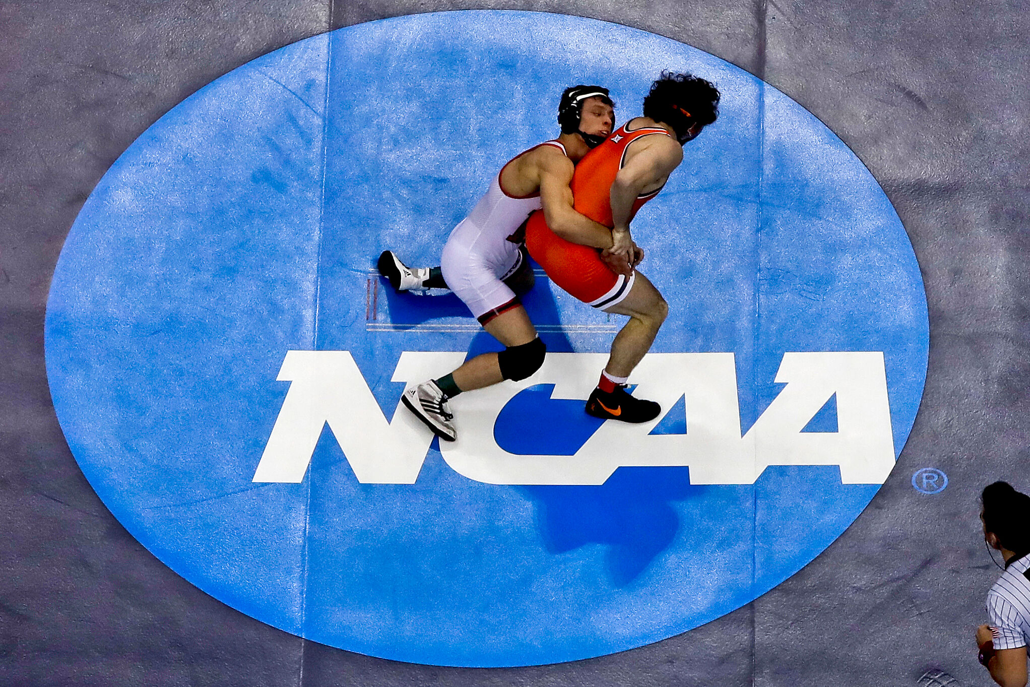 Rutger's Nick Suriano, left, works to control Oklahoma State's Daton Fix (not involved in case)