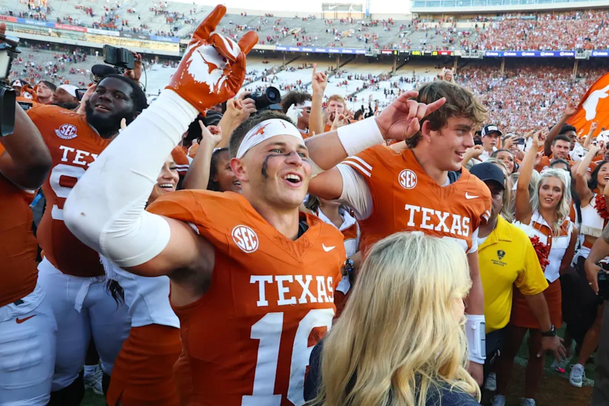 Texas Longhorns defensive back Michael Taaffe (16) celebrates with Texas Longhorns quarterback Arch Manning (16) after the game against the Oklahoma Sooners