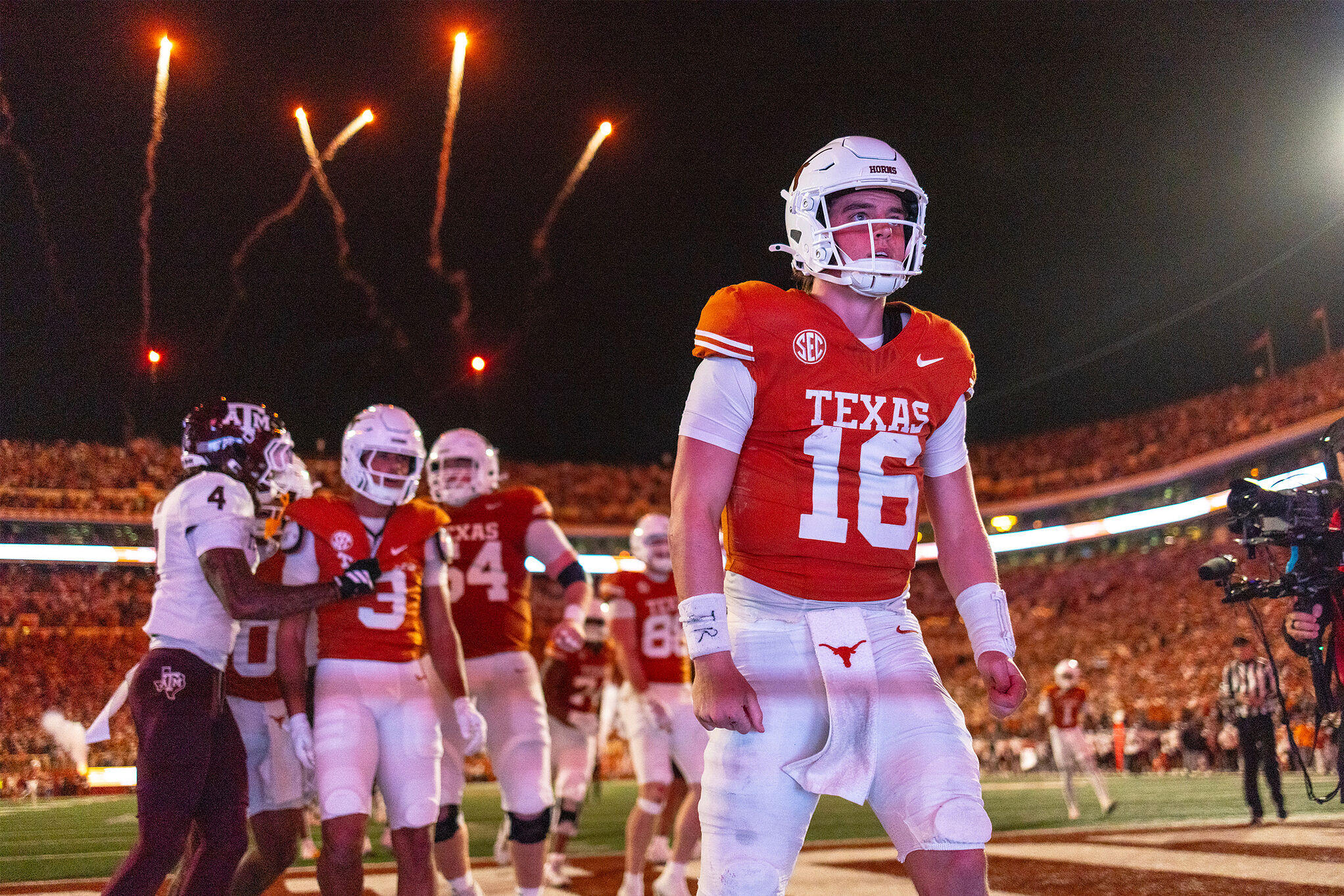 Texas quarterback Arch Manning (16) celebrated a touchdown against Texas A&M during an NCAA college football game against Texas A&M