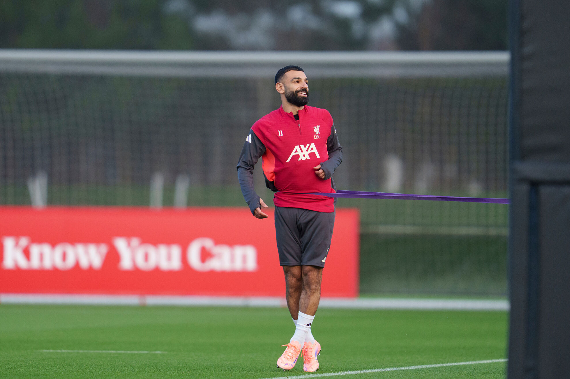 Liverpool's Mohamed Salah smiles as he takes part in a training session in Liverpool, England, Monday, Dec. 8, 2025.