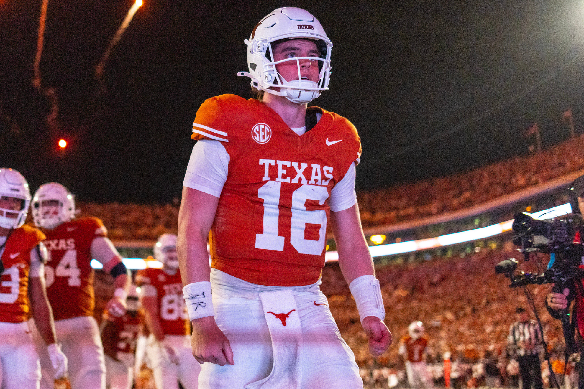 Arch Manning celebrates scoring a touchdown against Texas A&M.