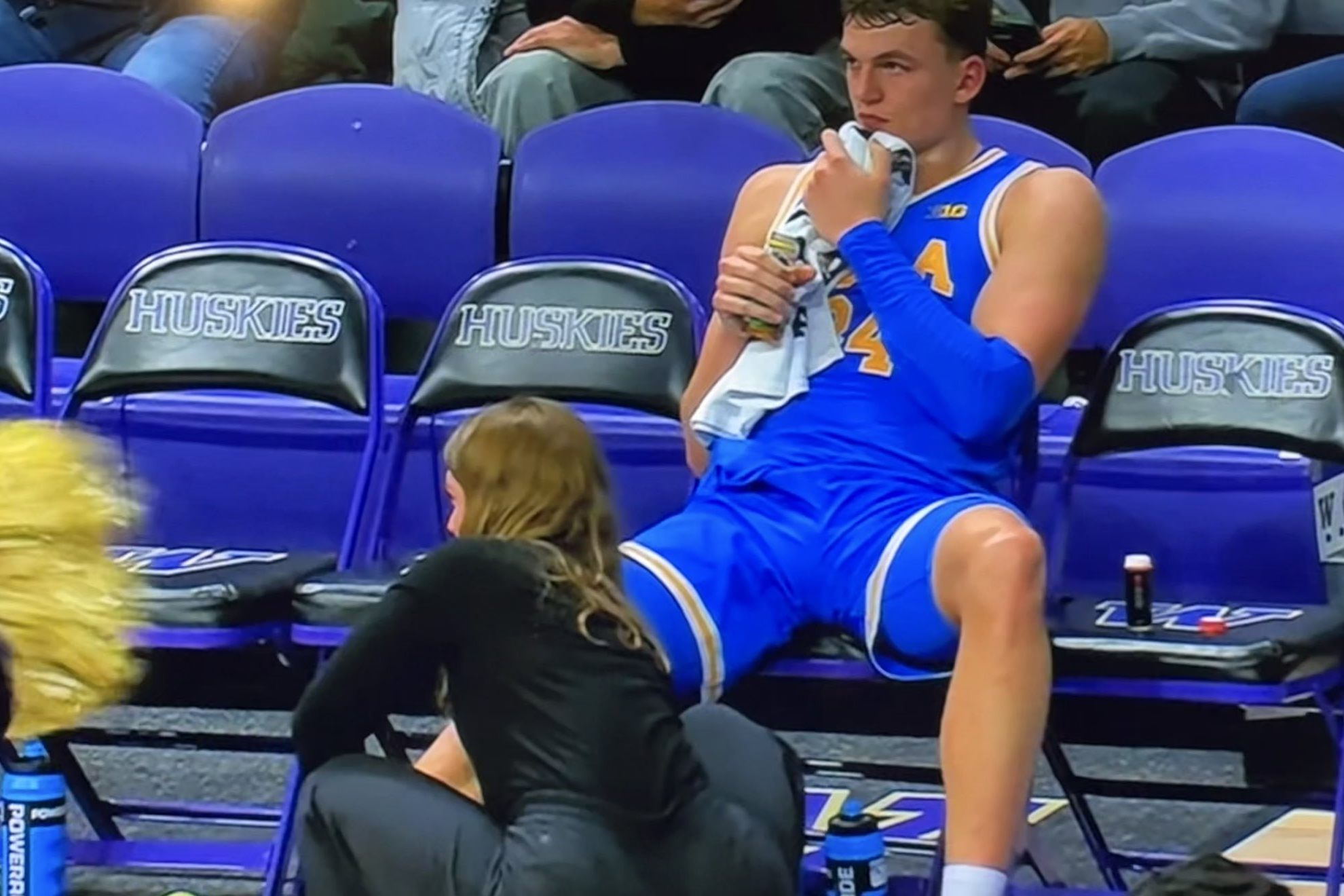 A UCLA coach went viral after her pose on the sidelines was caught by broadcast cameras