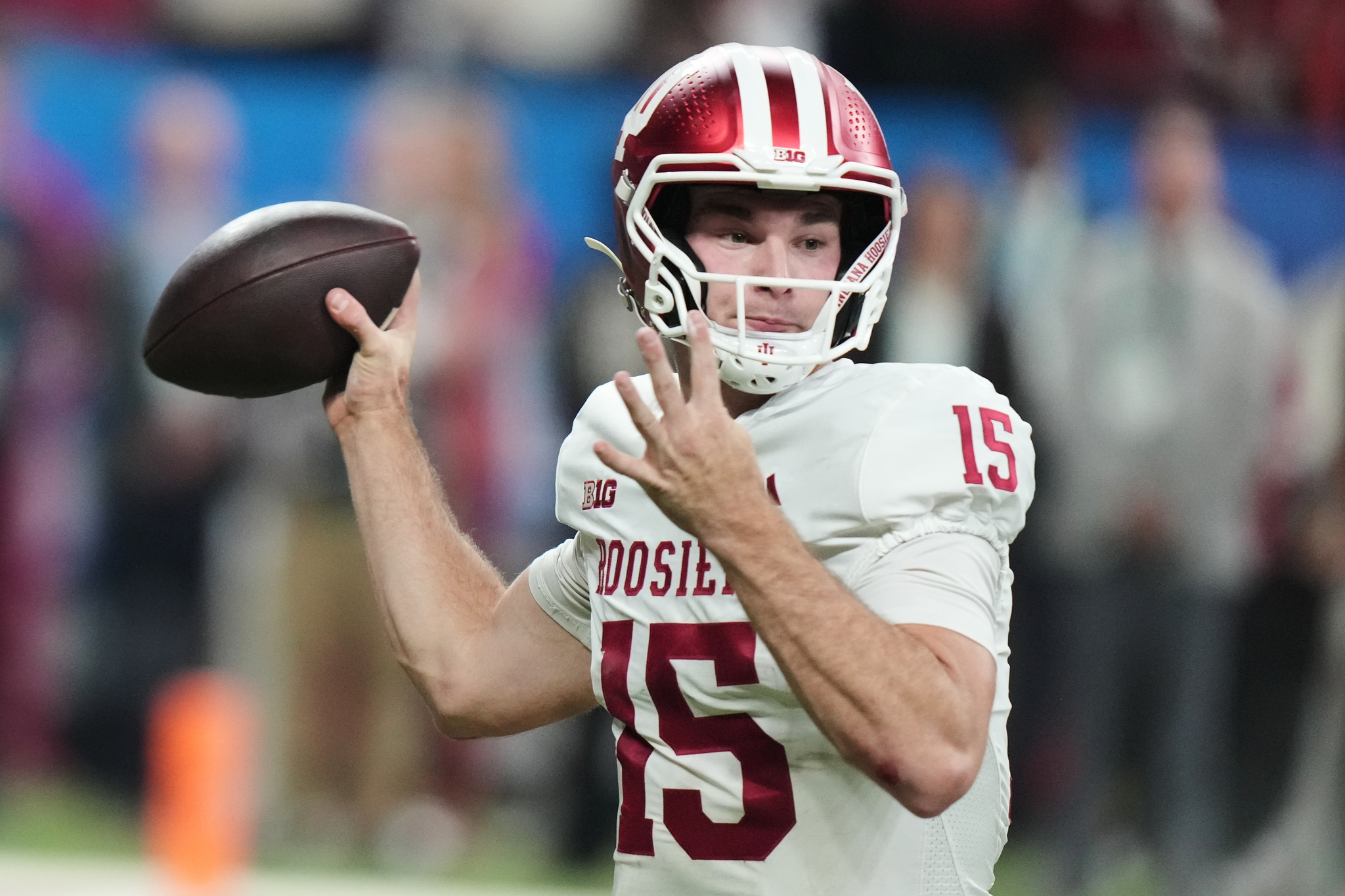 Indiana's Fernando Mendoza throws during the first half of the Big Ten championship NCAA college football game against Ohio State in Indianapolis.