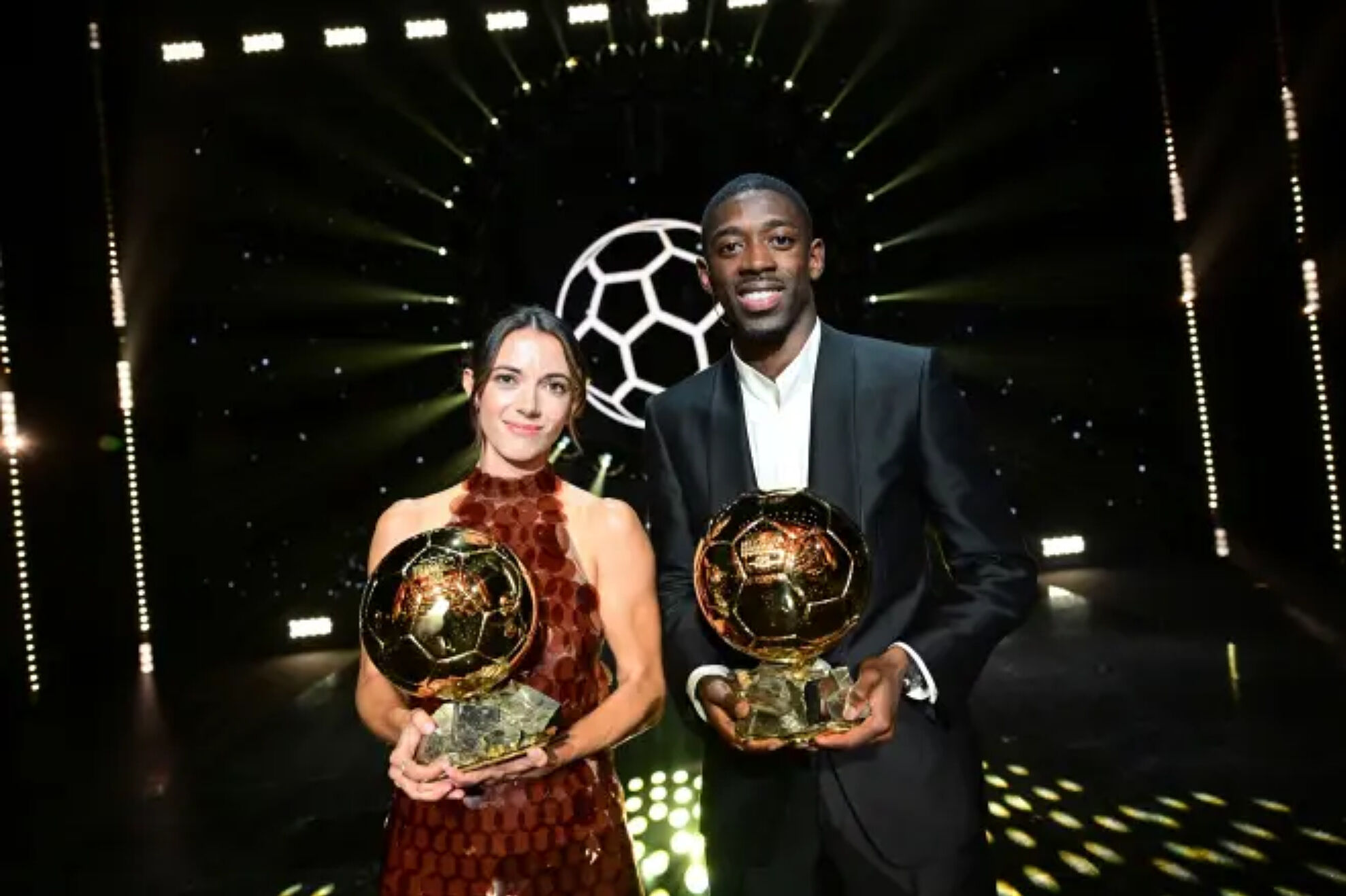 Aitana and Dembélé pose with the Ballon d'Or.