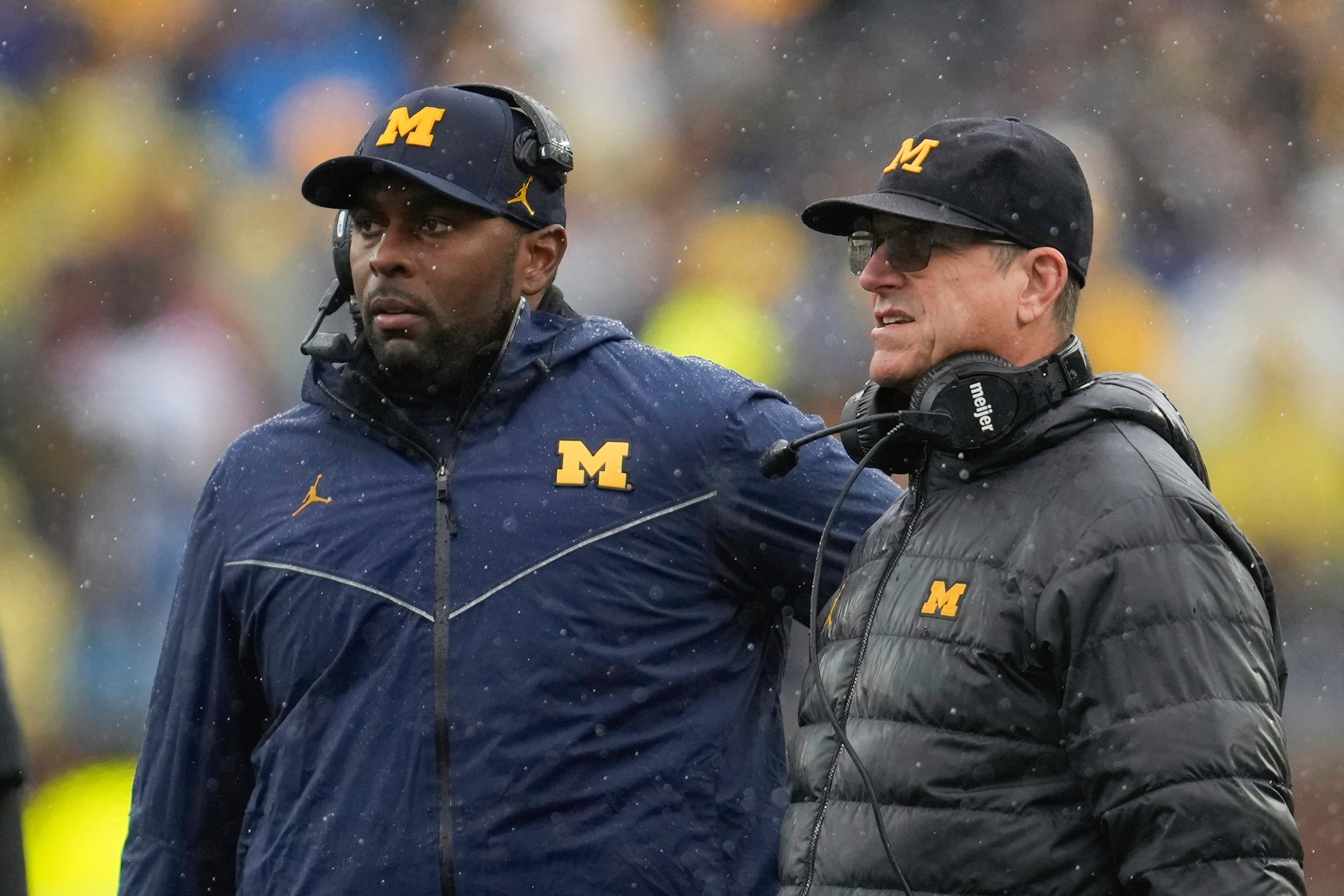 Sherrone Moore and Jim Harbaugh