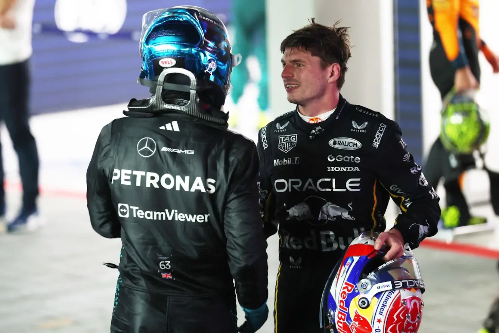 George Russell and Max Verstappen greet each other after the last Singapore GP.