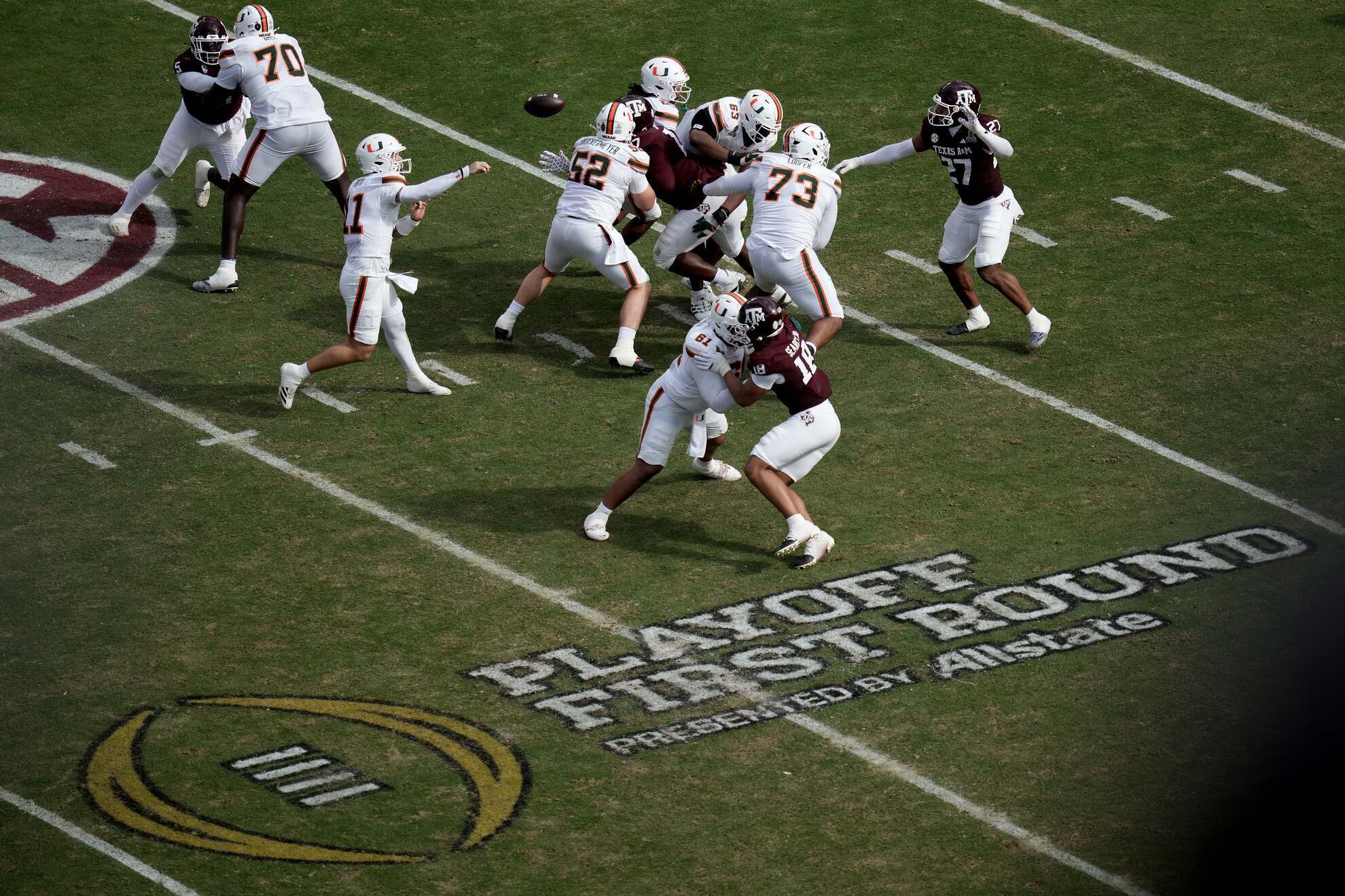 Miami quarterback Carson Beck passes down field