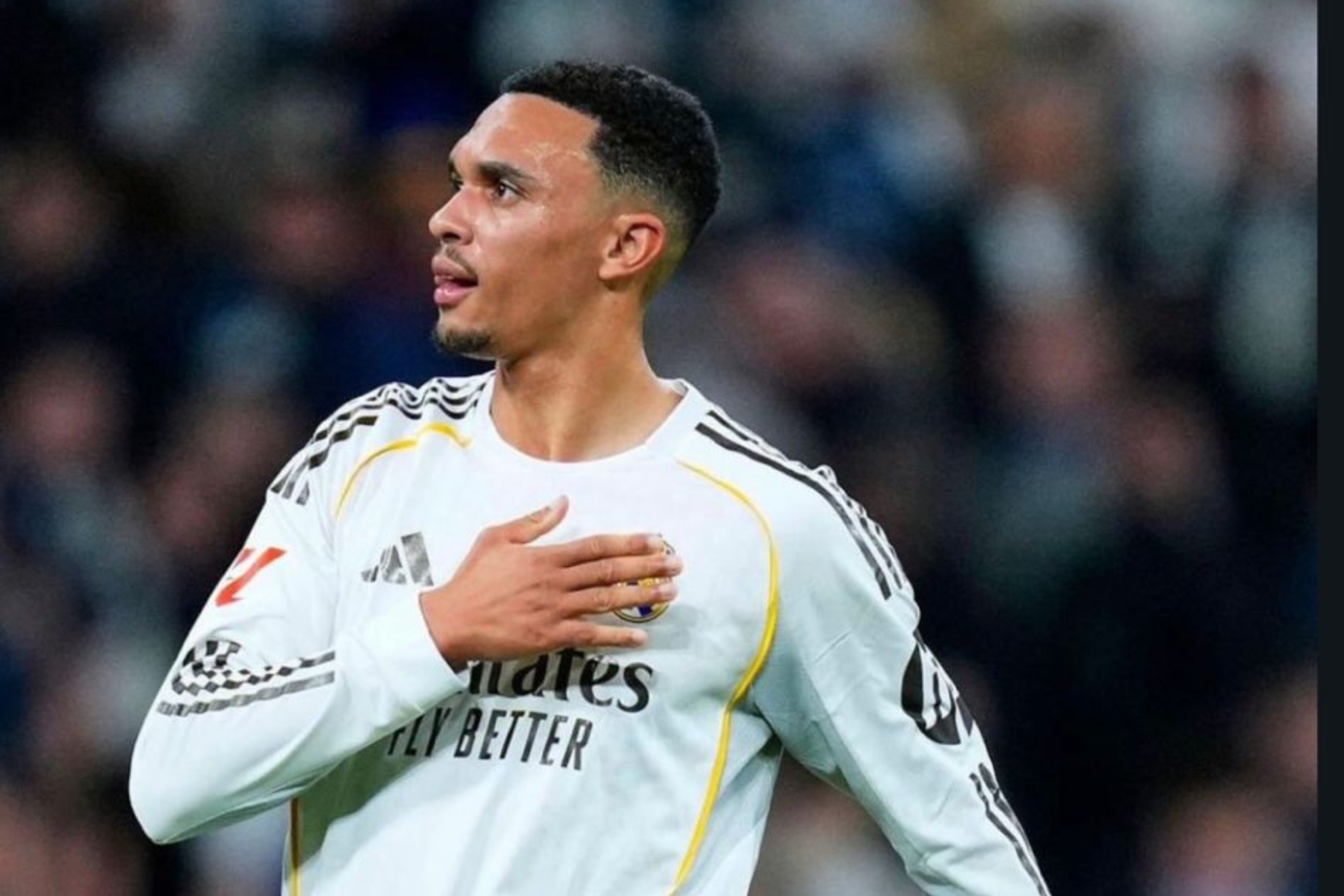 Trent points to the crest.