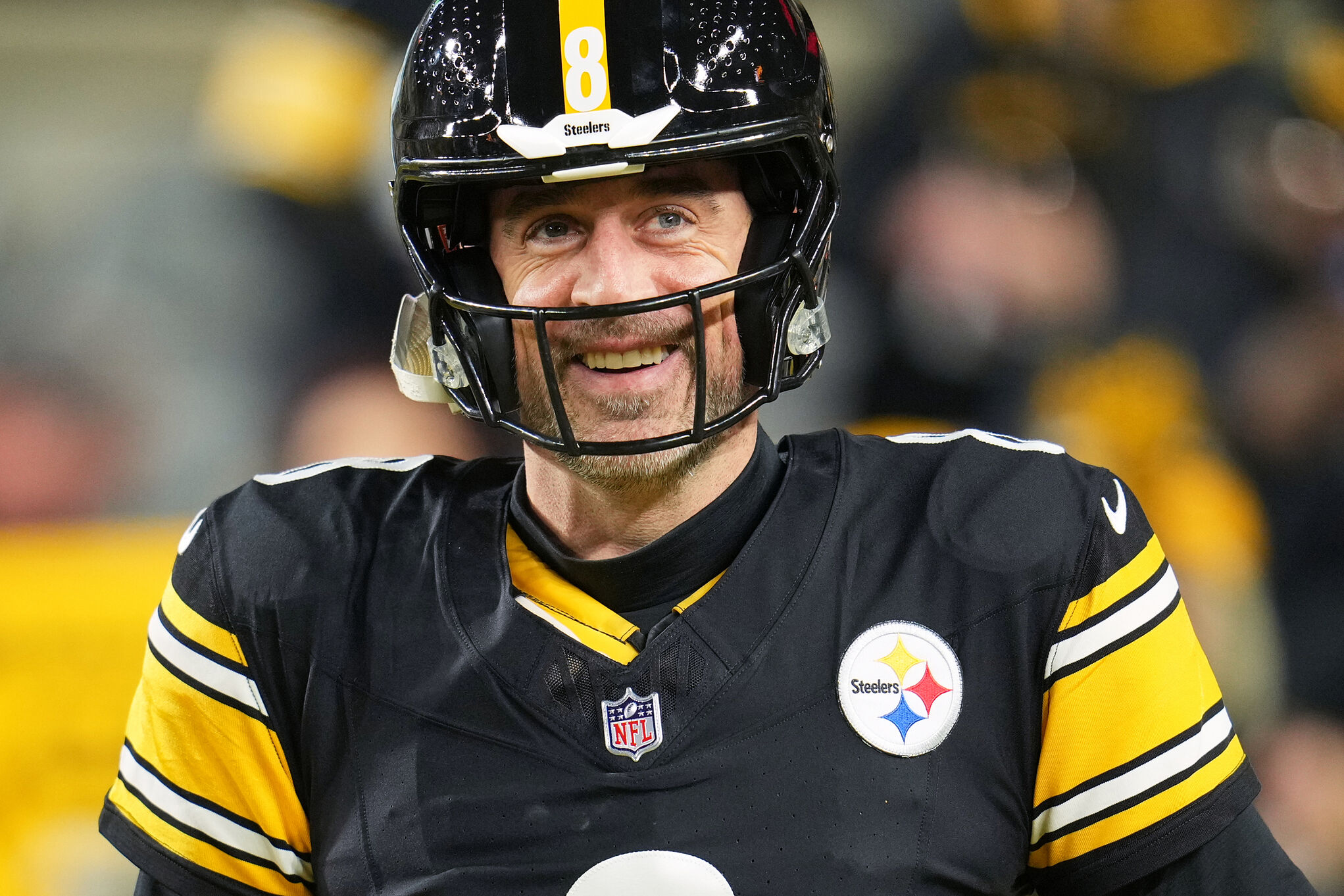 Pittsburgh Steelers quarterback Aaron Rodgers warms up before an NFL wild-card playoff football game against the Houston Texans