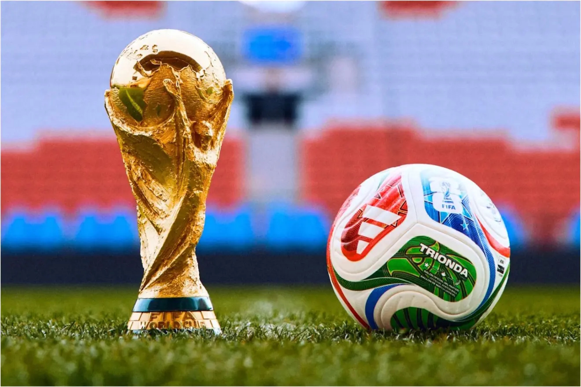 The World Cup trophy alongside the 2026 FIFA World Cup ball.