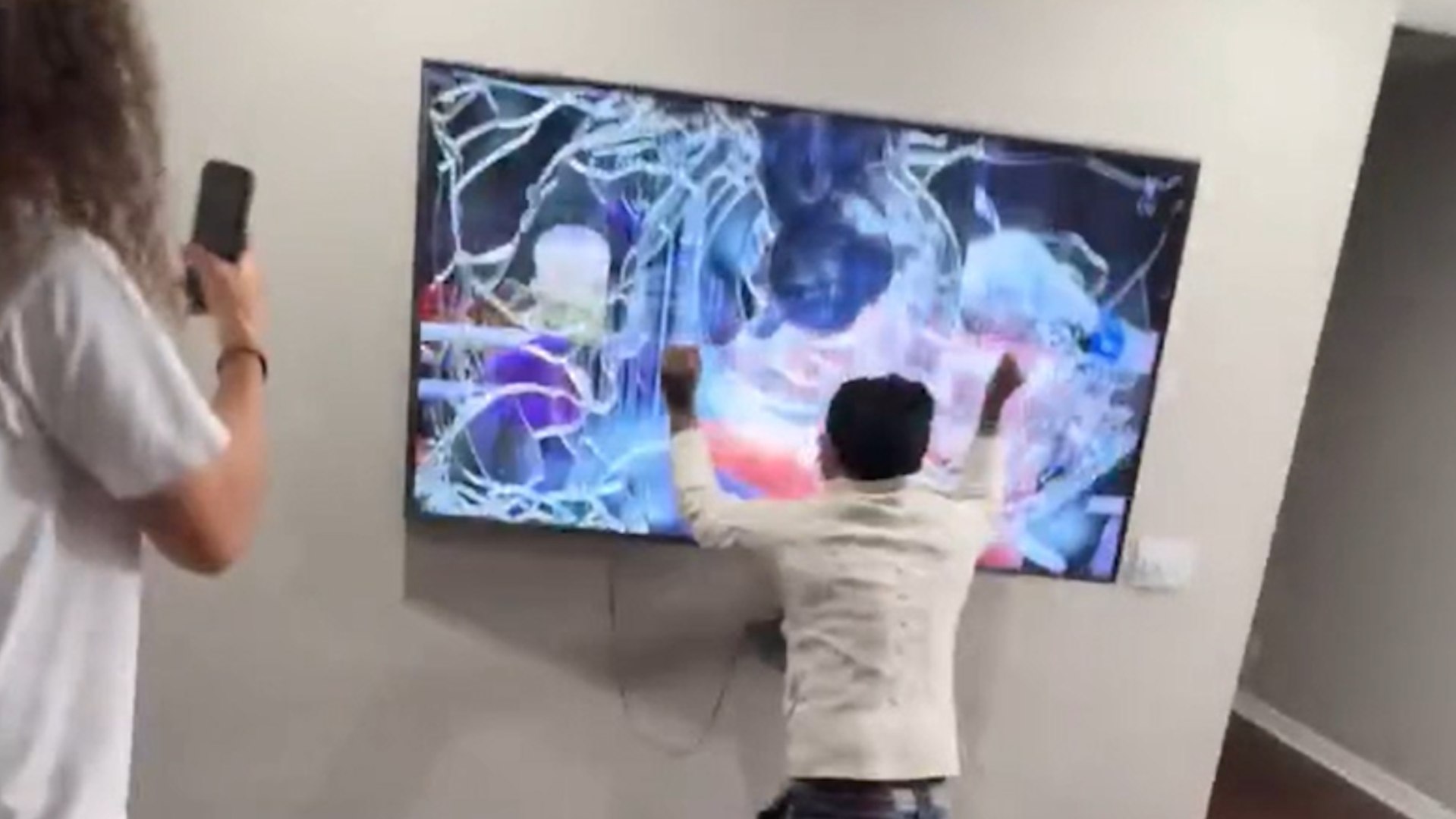 Fan smashes TV after Mike Tyson loses to Jake Paul