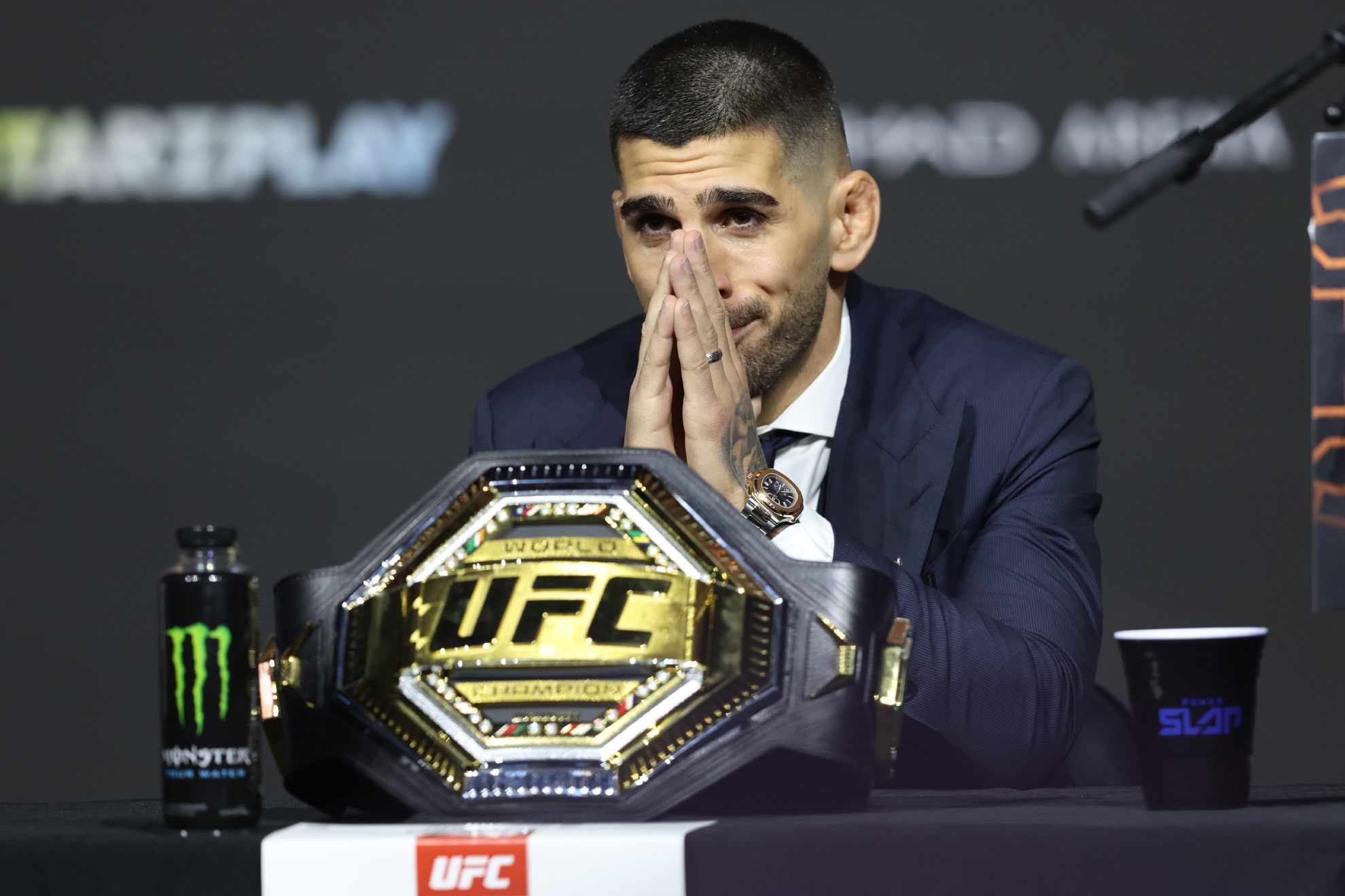 Ilia Topuria attends a press conference ahead of his featherweight championship bout at UFC 308 in Abu Dhabi /