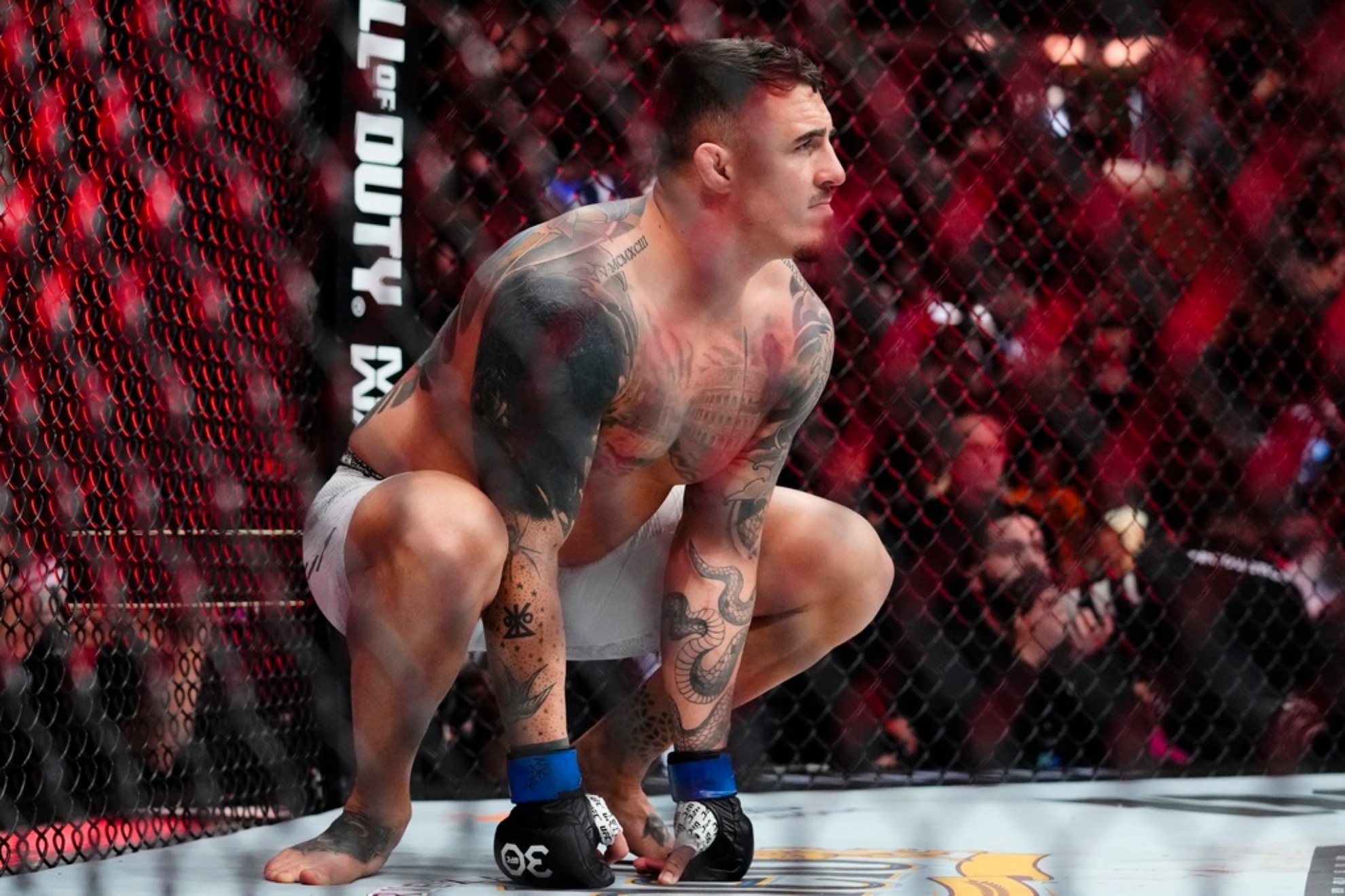 England's Tom Aspinall waits for the start of a heavyweight title bout against Russia's Sergei Pavlovich.