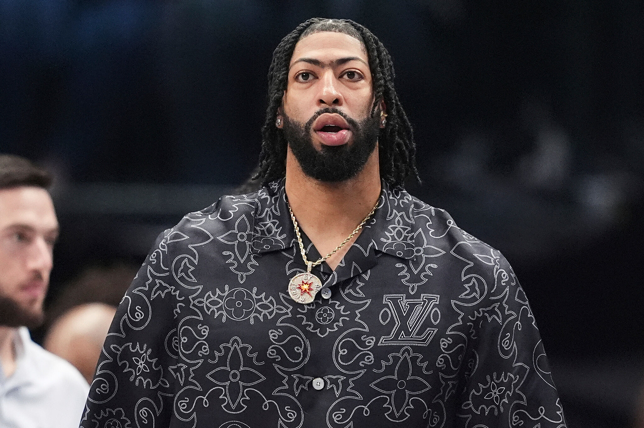 Former Dallas Mavericks forward Anthony Davis walks onto the court during a timeout against Milwaukee Bucks