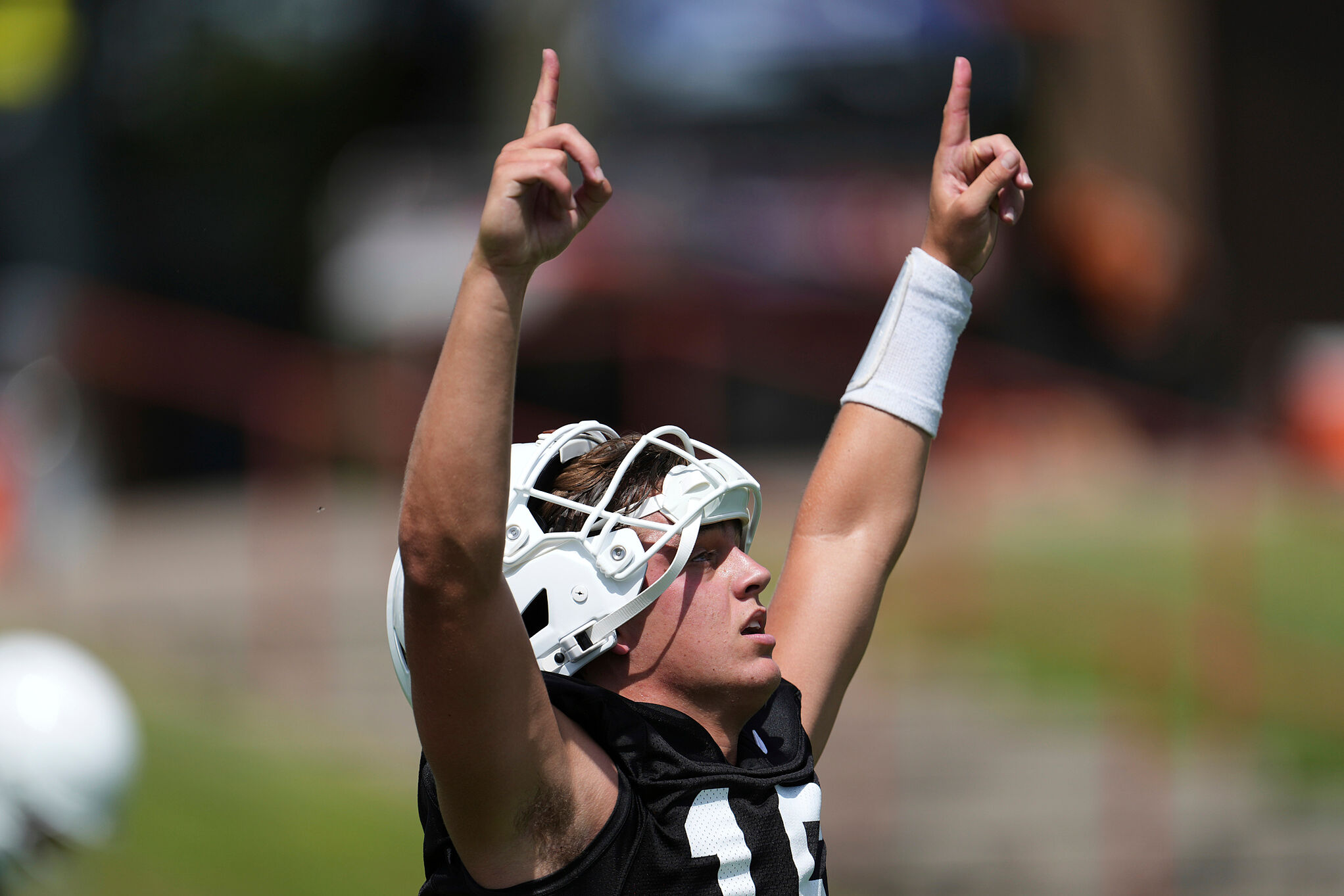 Texas quarterback Arch Manning (16) reacts during an NCAA college football practice in Austin, Texas