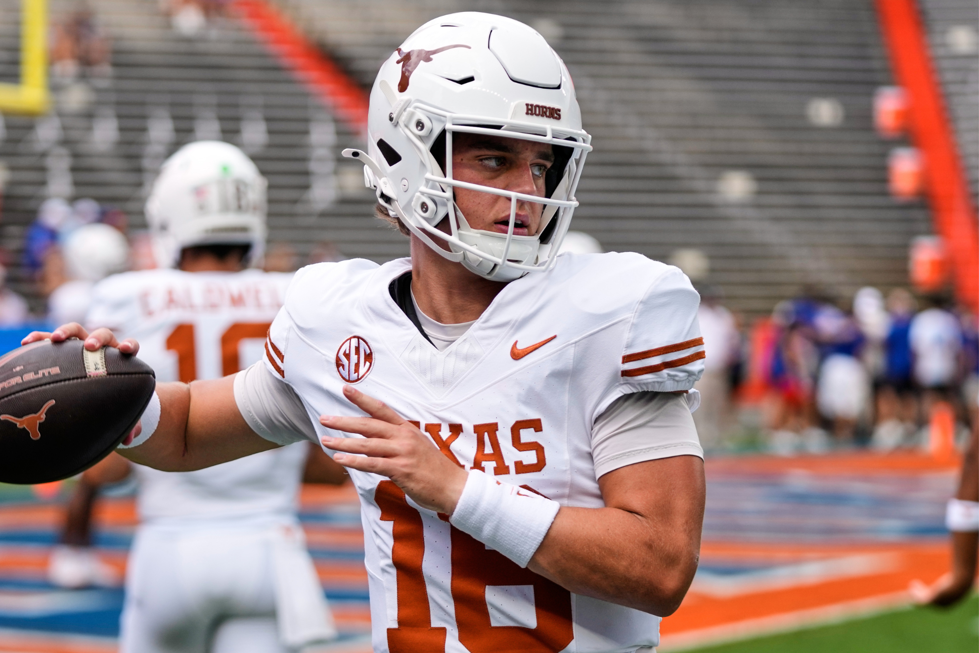 Arch Manning warms up before a Texas Longhorns game during the 2025 season.