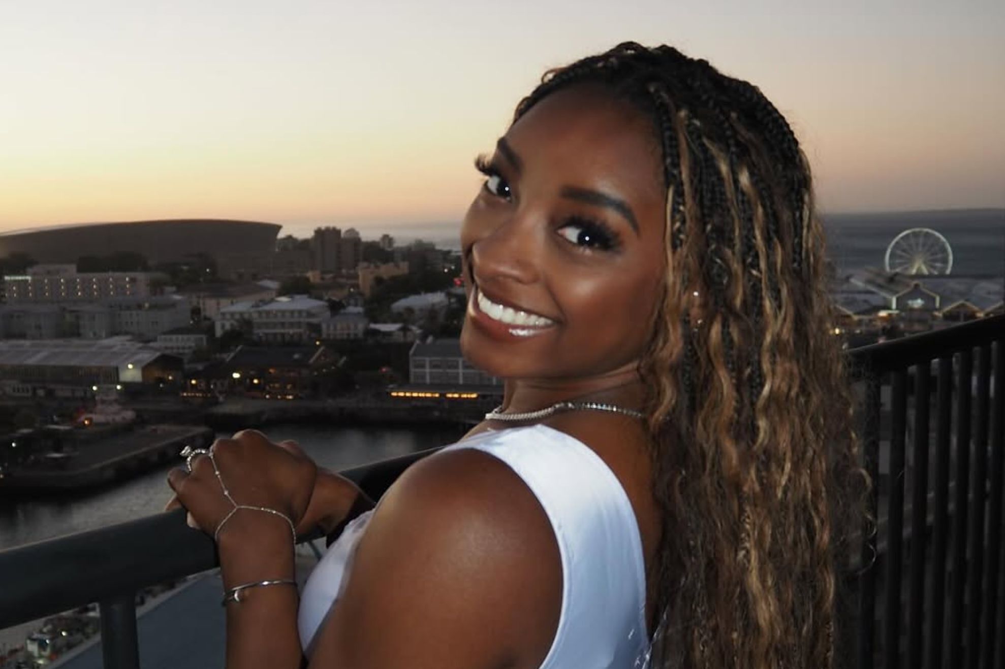 Simone Biles goes wild with a tequila bottle in hand turning her private jet trip into a party