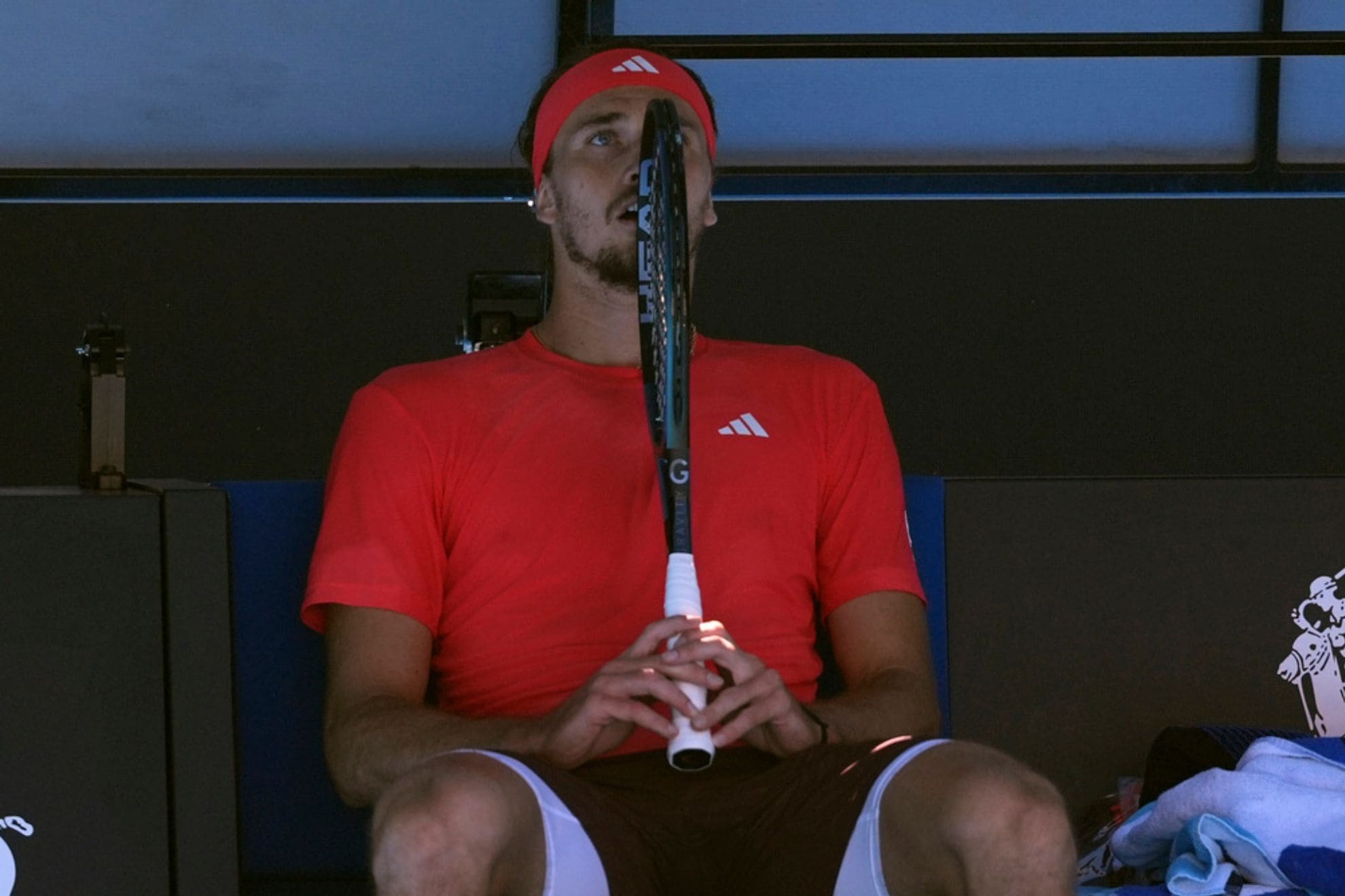Alexander Zverev of Germany reacts after Novak Djokovic of Serbia retired from their semifinal match at the Australian Open tennis championship in Melbourne, Australia, Friday, Jan. 24, 2025. (AP Photo/Ng Han Guan)