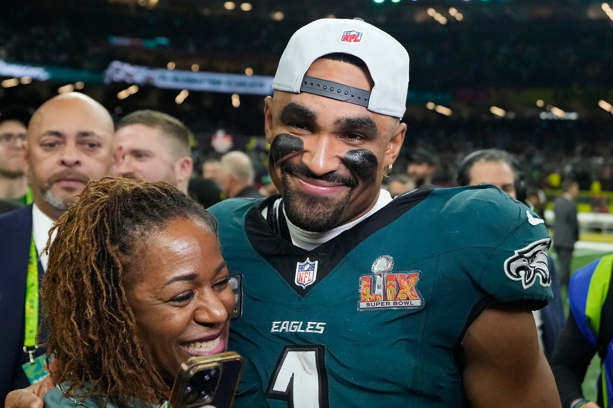 Jalen Hurts hugs his mother, Pamela Hurts, after he won the Super Bowl with the Philadelphia Eagles.