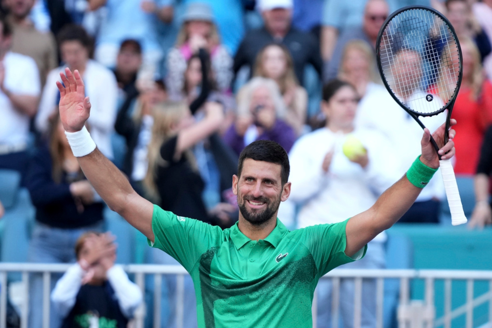 Novak Djokovic, of Serbia, waves to the crowd after defeating Rinky Hijikata, of Australia, during the Miami Open.