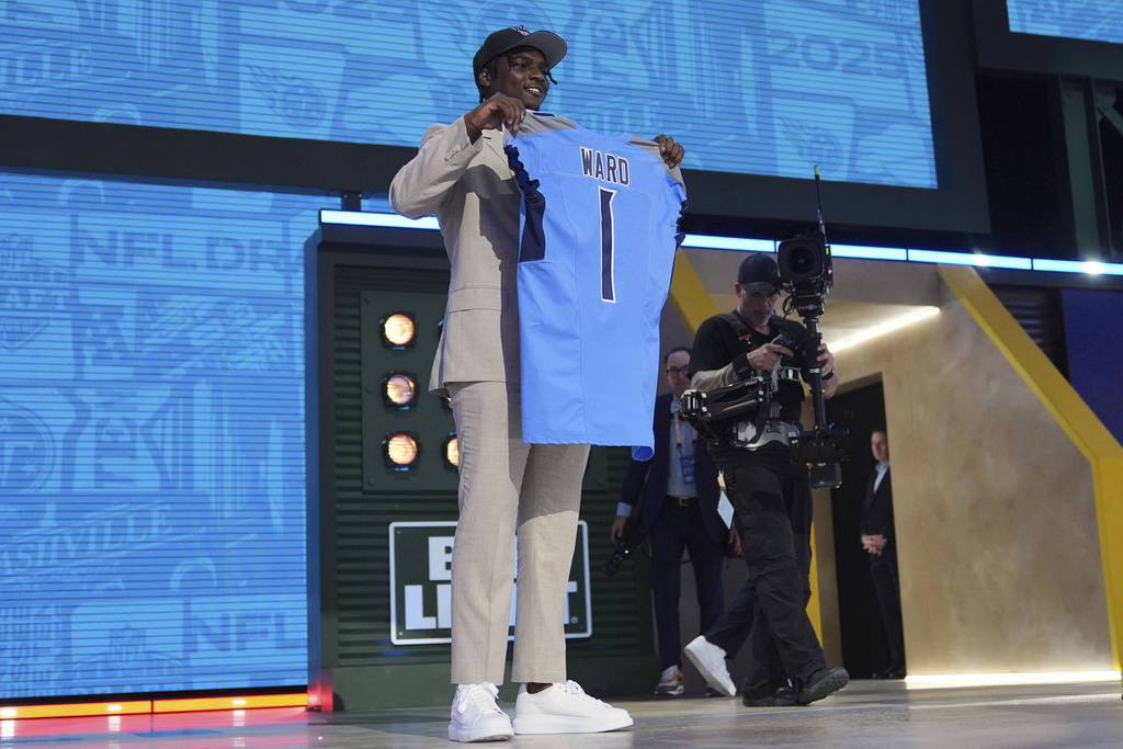 Miami quarterback Cam Ward poses after being chosen by the Tennessee Titans with the first overall pick.