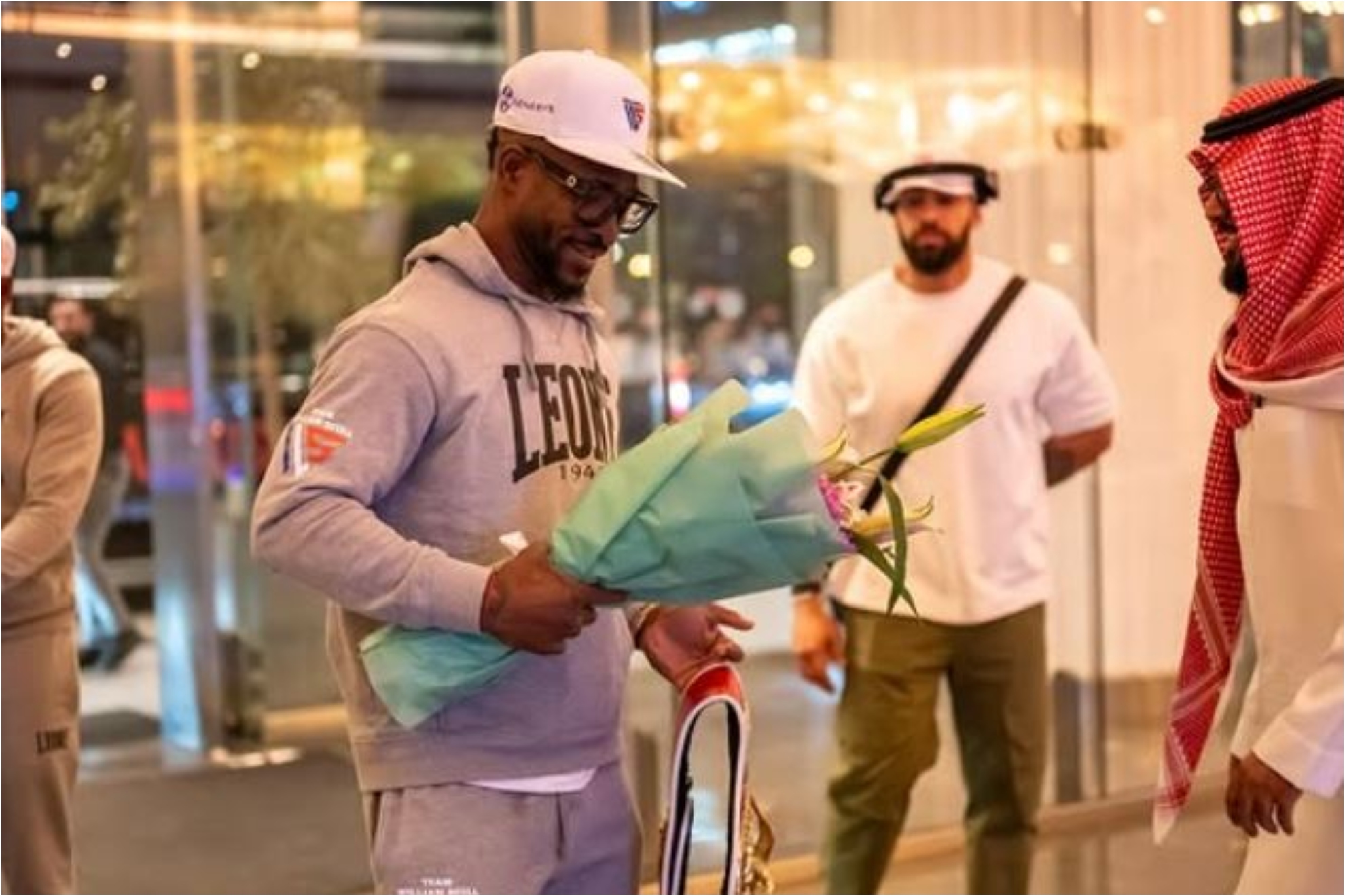 William Scull receives a bouquet of flowers during his stay in Saudi Arabia.