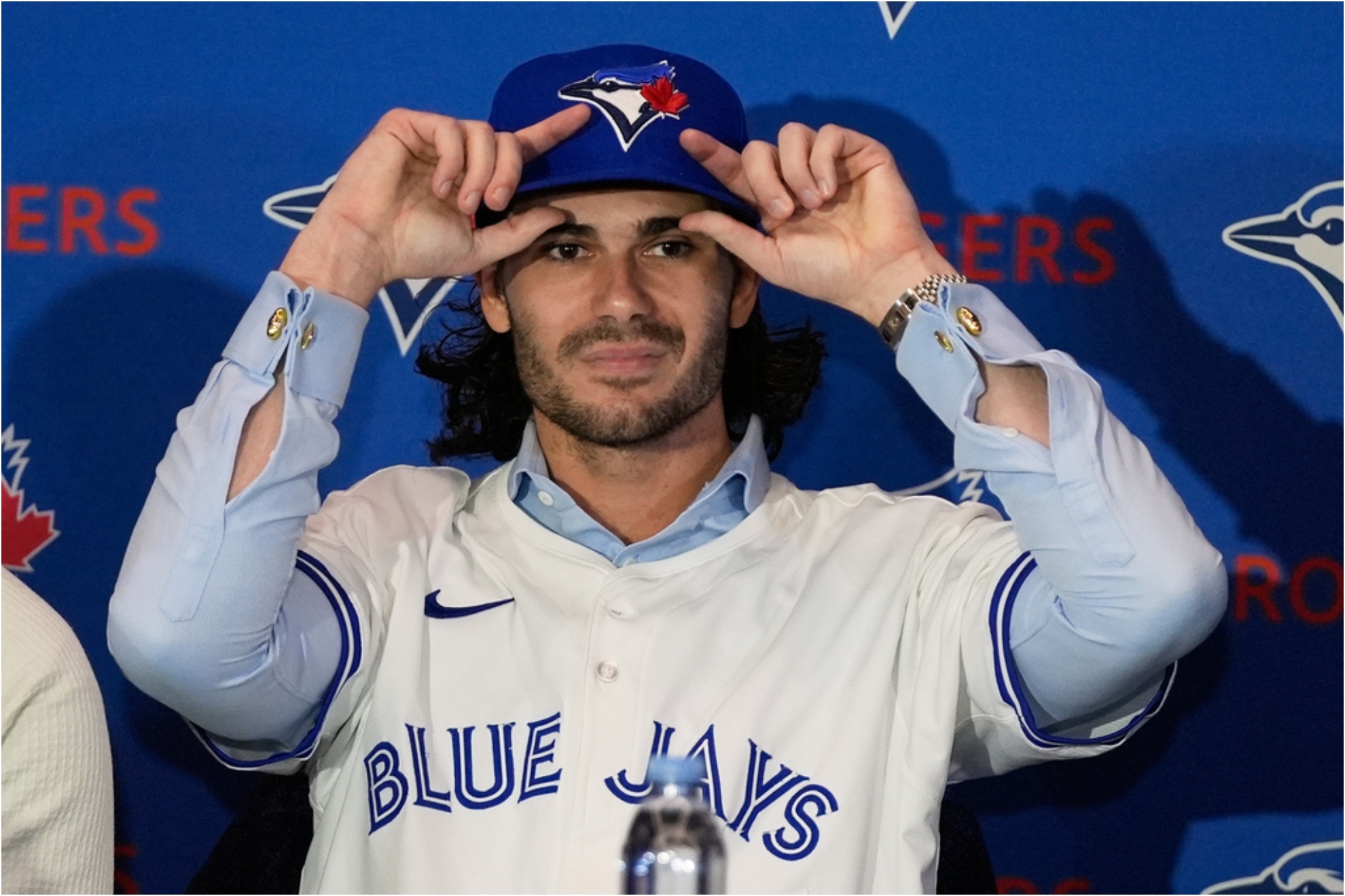 Dylan Cease, pitcher for the Toronto Blue Jays adjusts his cap.