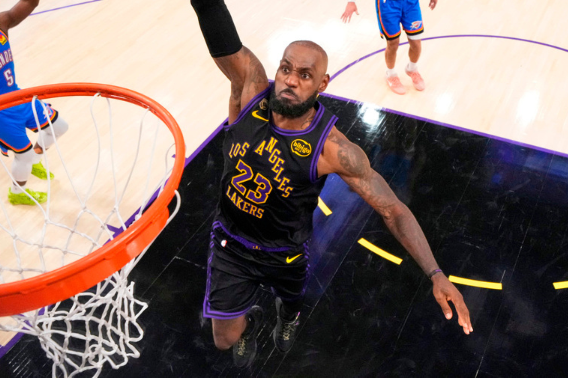 Los Angeles Lakers small forward LeBron James throws down a dunk against the Oklahoma City Thunder.
