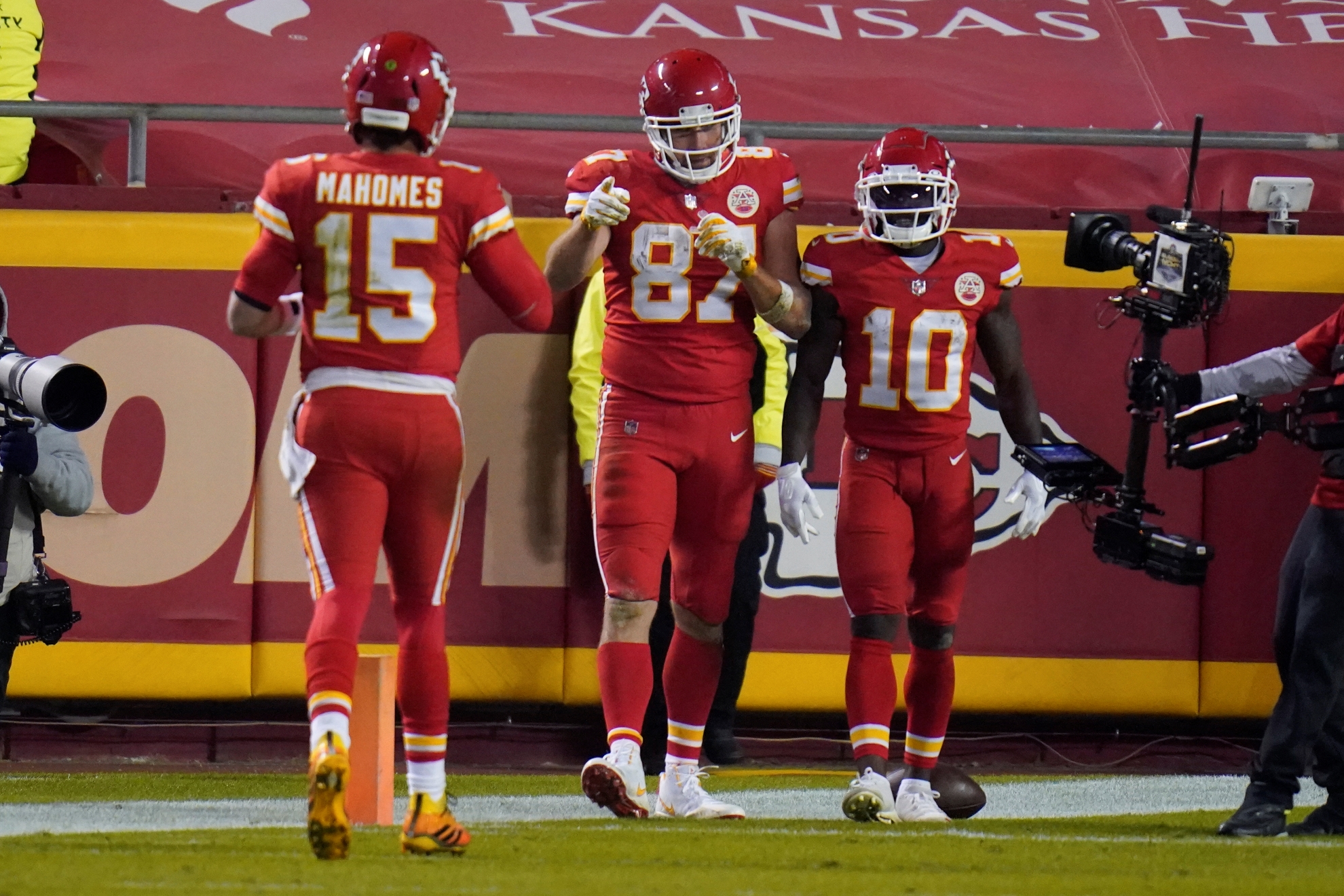 Kansas City Chiefs tight end Travis Kelce (87) celebrates his 20-yard touchdown reception with Patrick Mahomes (15) Tyreek Hill (10)