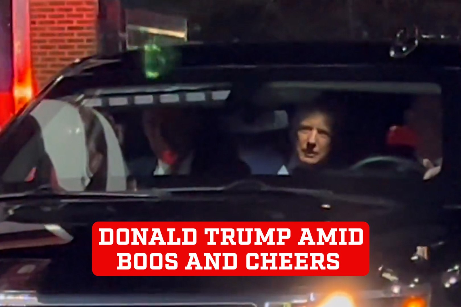 Donald Trump amid boos and cheers as he arrives for South Carolina-Clemson game