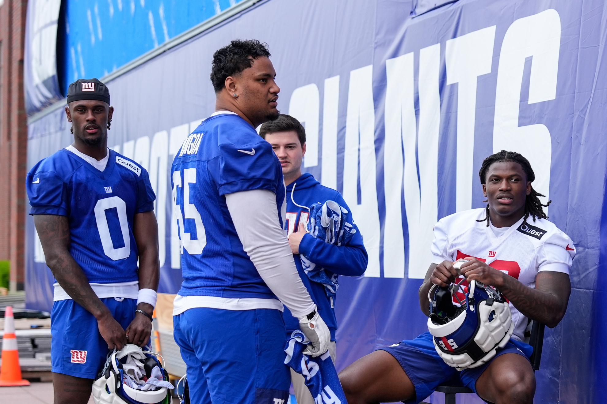 New York Giants' Arvell Reese, Francis Mauigoa and Malachi Fields