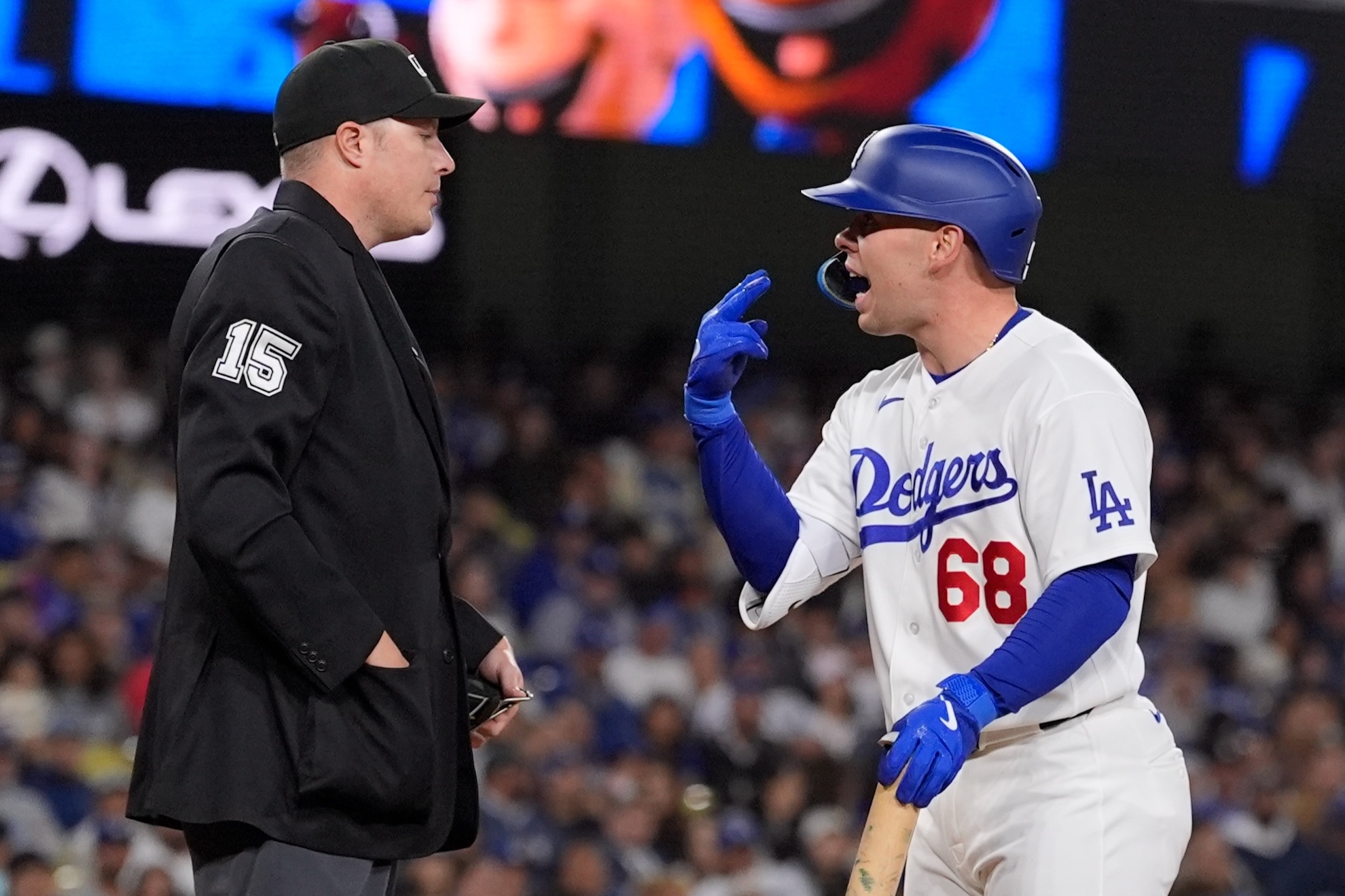 Los Angeles Dodgers' Dalton Rushing argues with home plate umpire Clint Vondrak