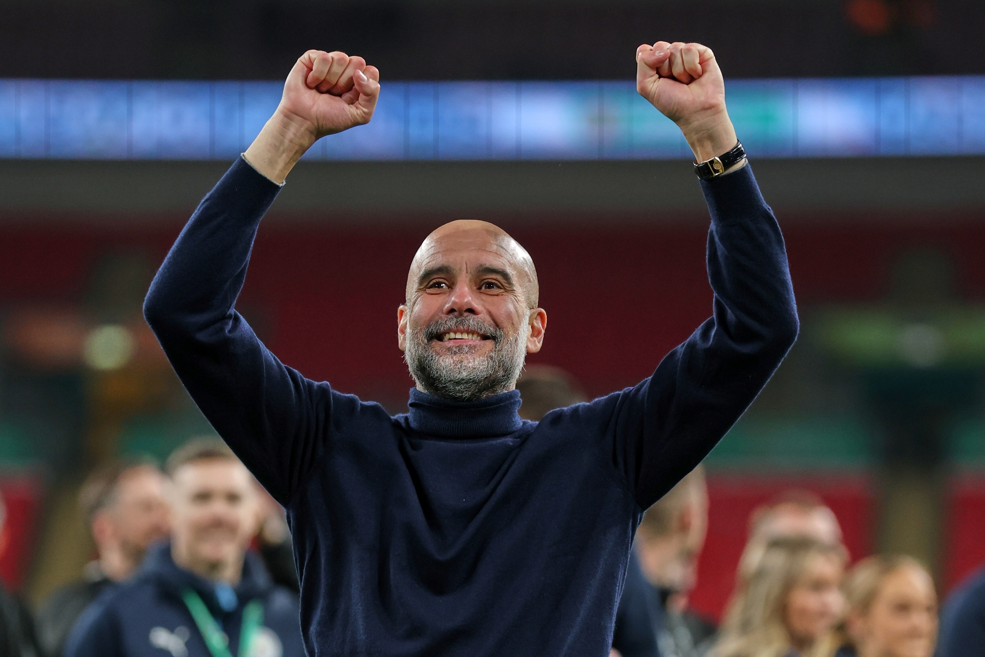 Manchester City's head coach Pep Guardiola celebrates after his team won the English League Cup final