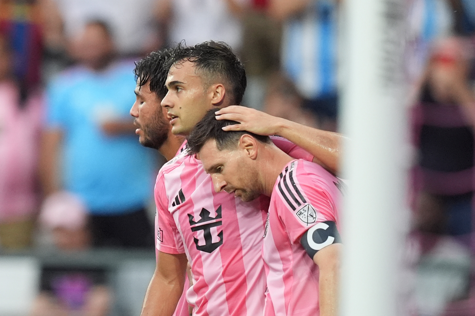Leo Messi is congratulated by Sergio Reguilon after scoring against the Portland Timbers.