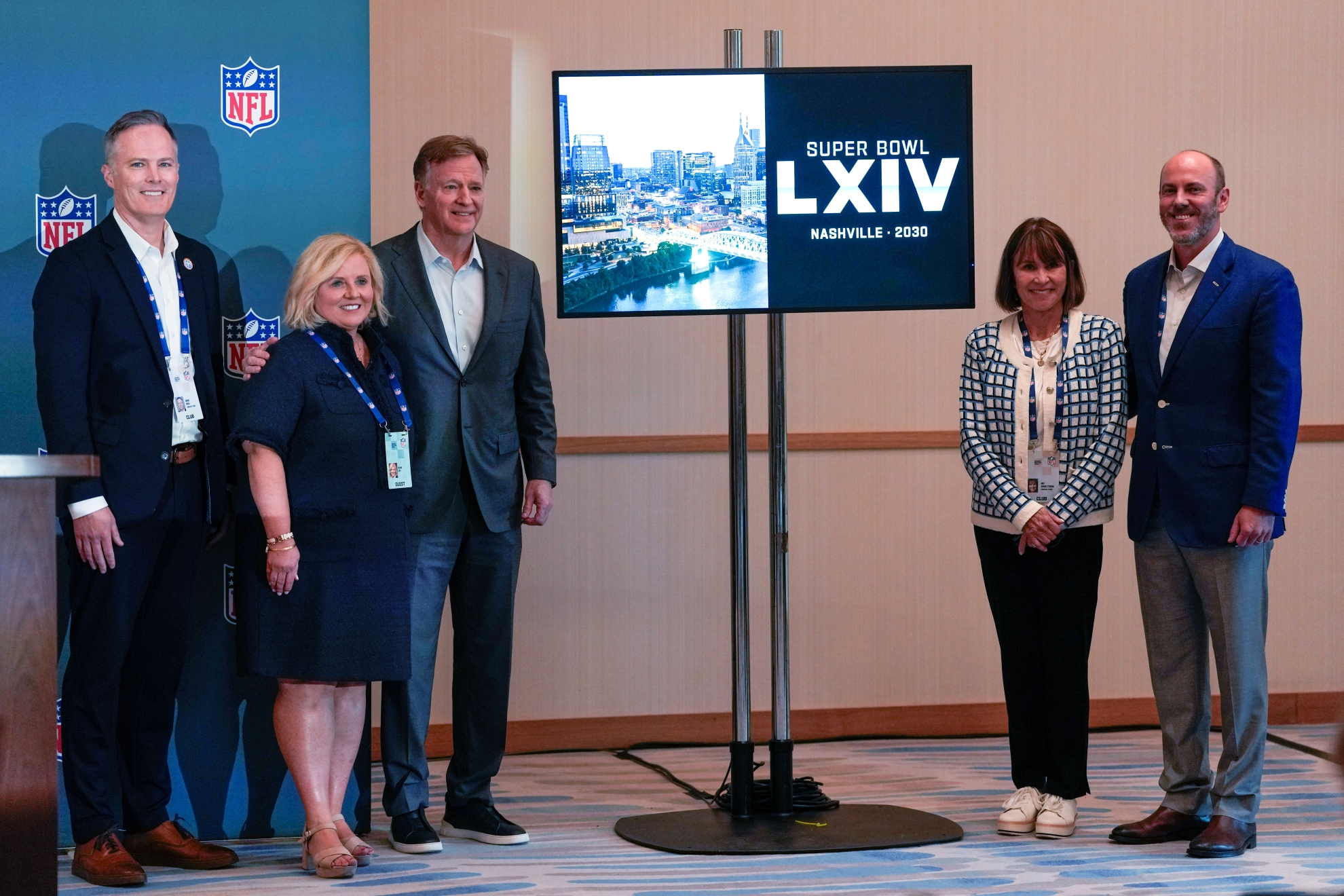 Tennessee Titans ownership group, gather for a photo at the NFL football owners' meetings after it was announced Nashville will host the 2030 Super Bowl