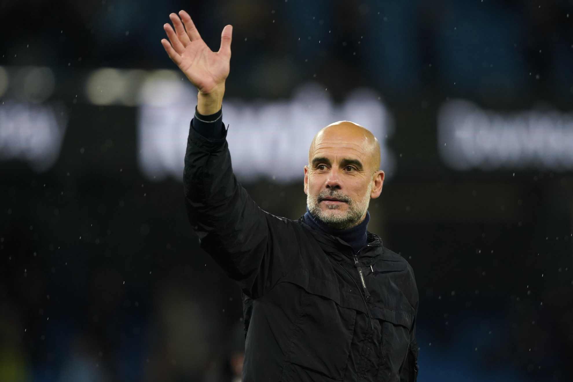 Manchester City's head coach Pep Guardiola greets fans at the end of the English Premier League soccer match between Manchester City and Crystal Palace in Manchester, England, Wednesday, May 13, 2026. (AP Photo/Ian Hodgson)