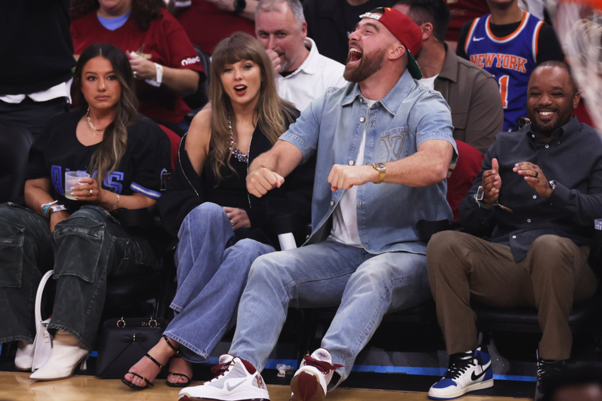 Taylor Swift and Travis Kelce sit courtside at the Cleveland Cavaliers arena during Game 3 of the Eastern Conference Finals.
