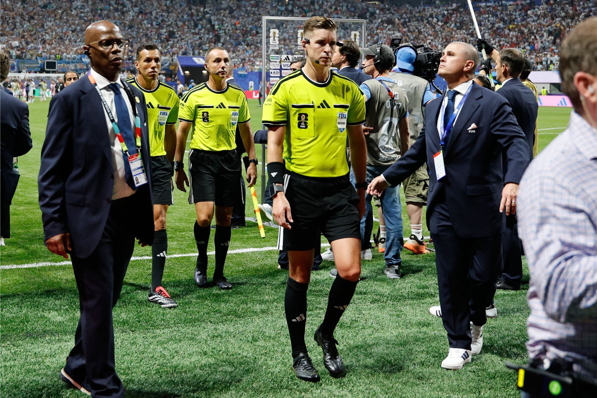 Referee Francois Letexier, of France, leaves the pitch after Argentina vs Egypt