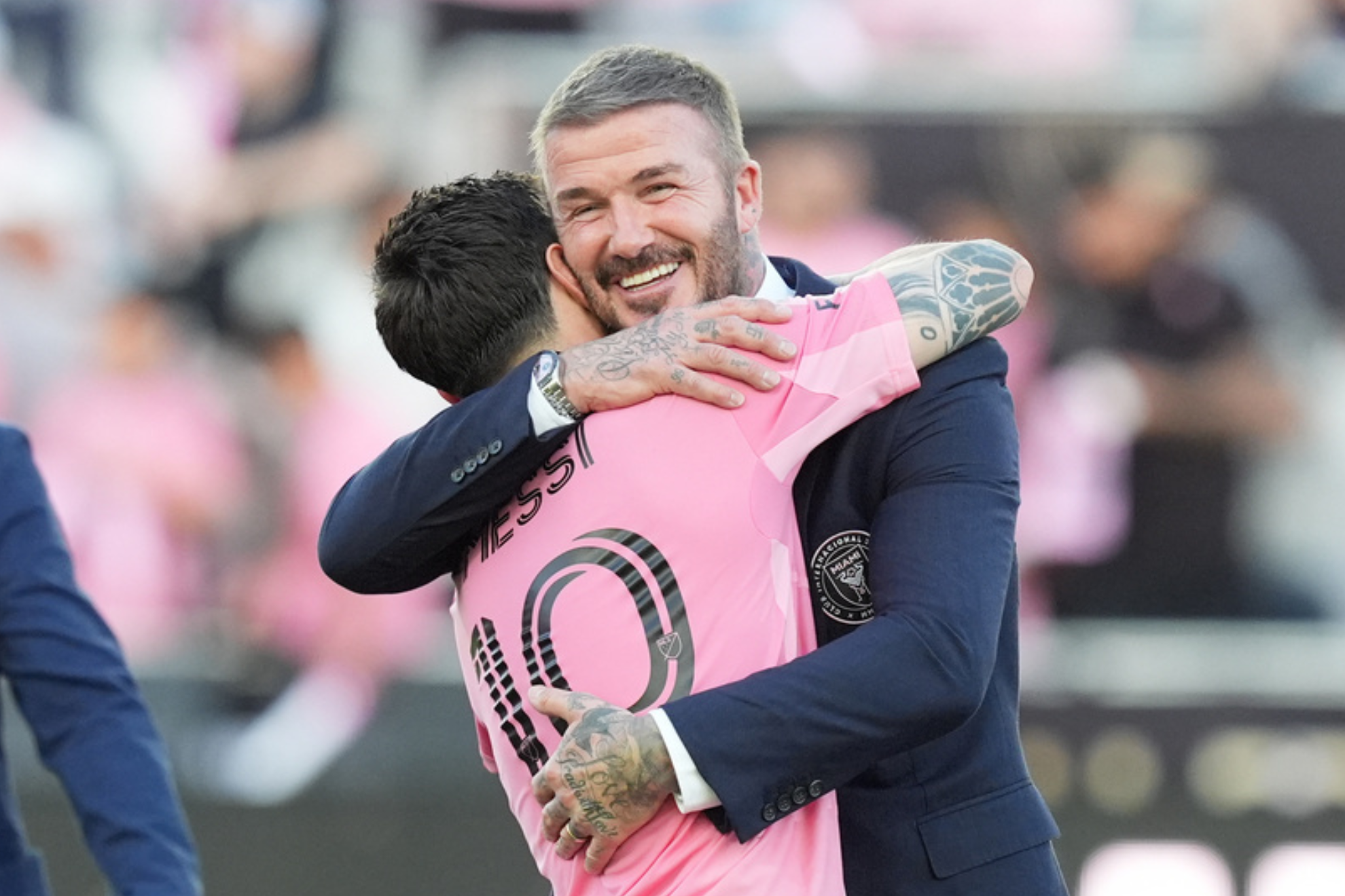 David Beckham hugs Lionel Messi (10) Rebecca Blackwell
