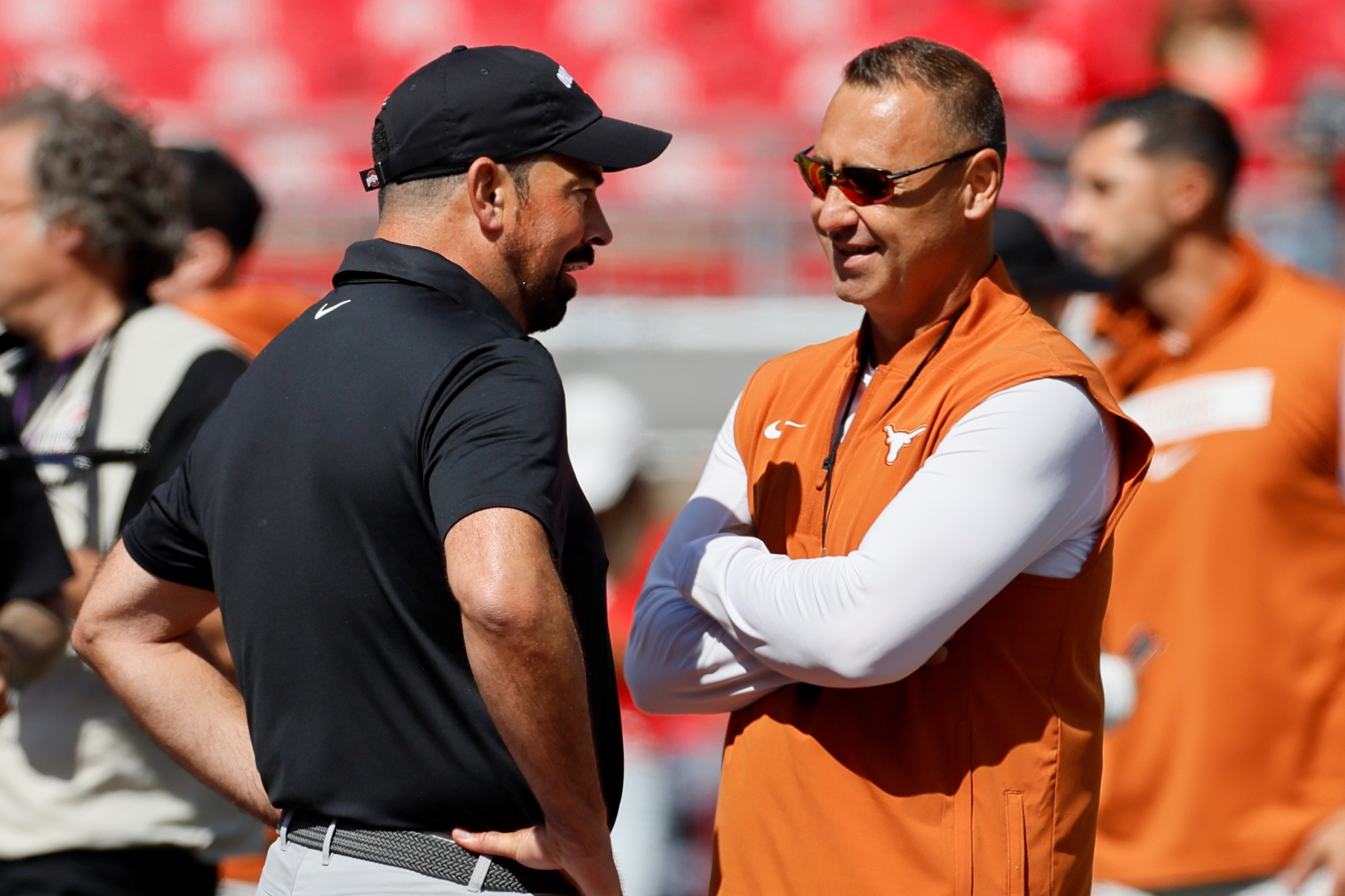 Ohio State head coach Ryan Day, left, and Texas head coach Steve Sarkisian LaPresse